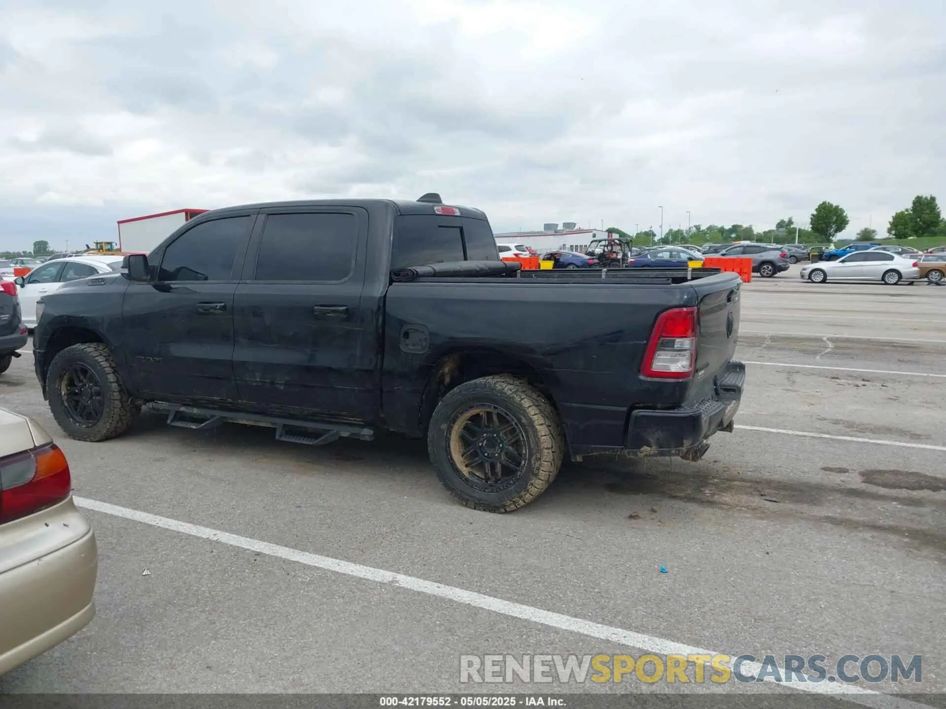 13 Photograph of a damaged car 1C6SRFFT2LN159572 RAM 1500 2020