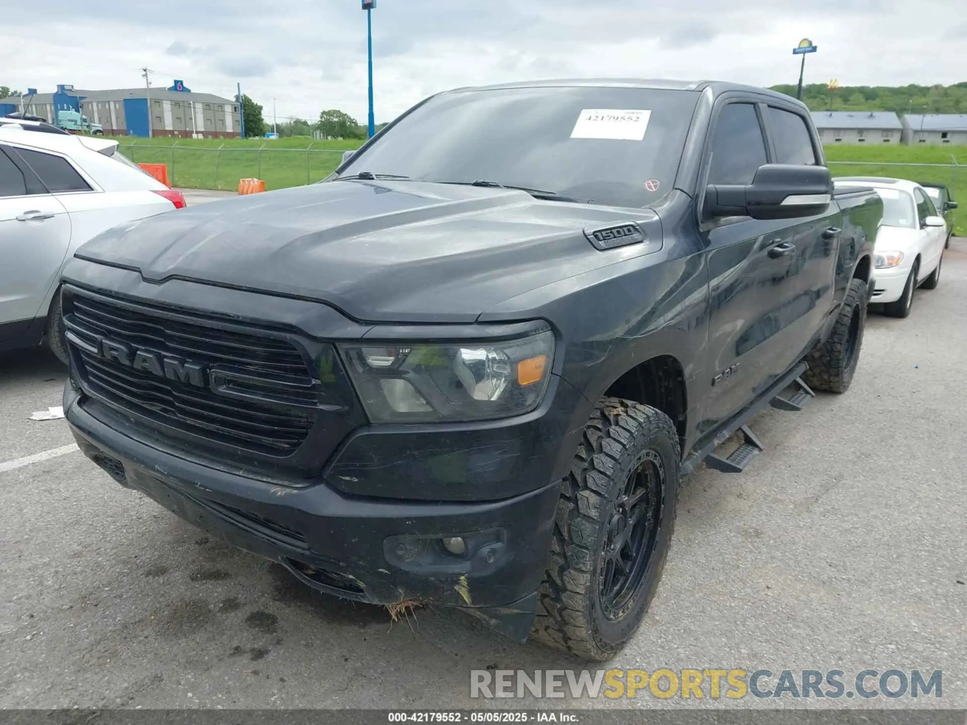 2 Photograph of a damaged car 1C6SRFFT2LN159572 RAM 1500 2020