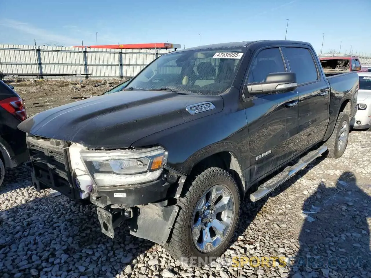 1 Photograph of a damaged car 1C6SRFFT2LN171768 RAM 1500 2020