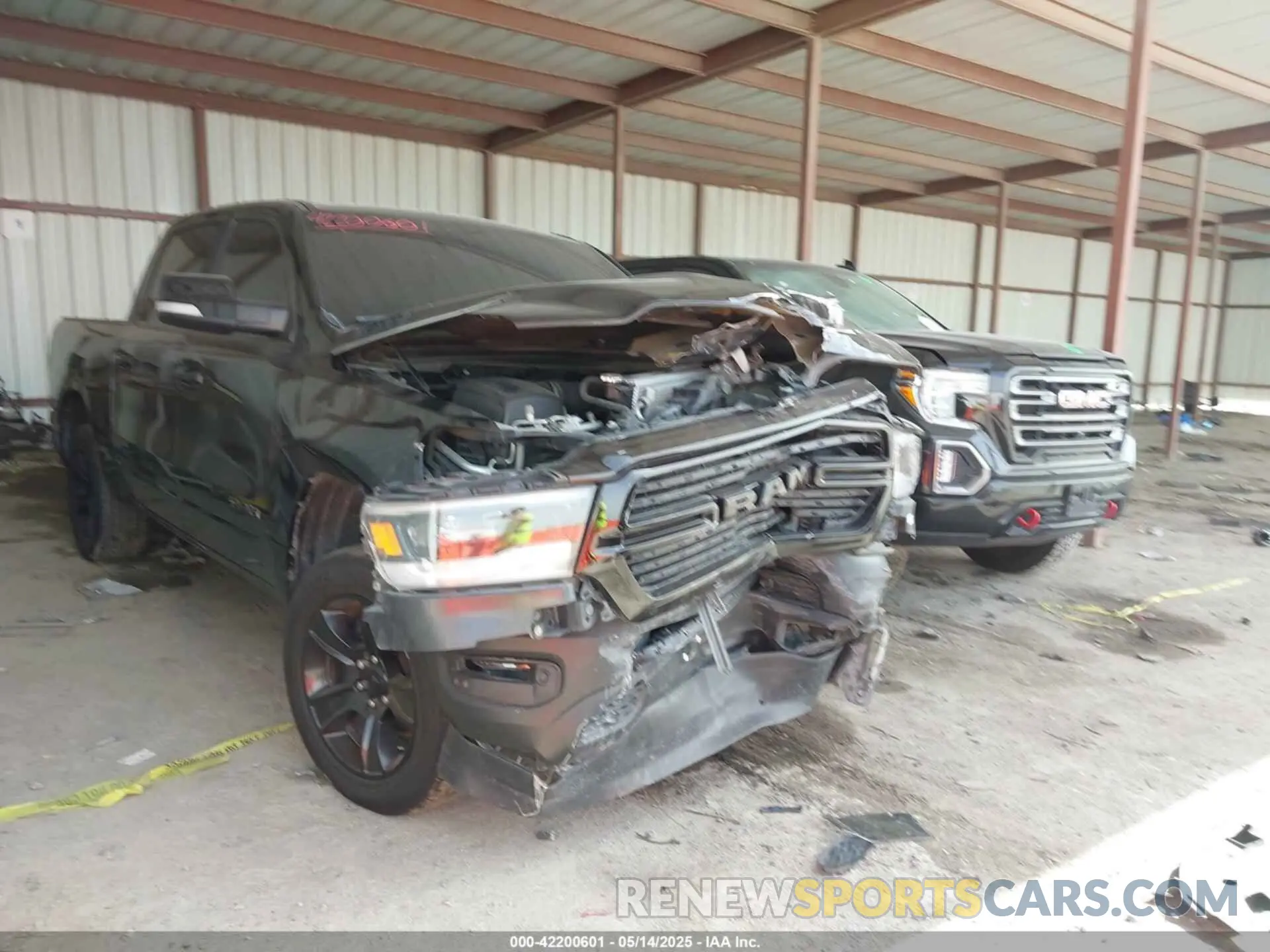 1 Photograph of a damaged car 1C6SRFFT2LN206860 RAM 1500 2020