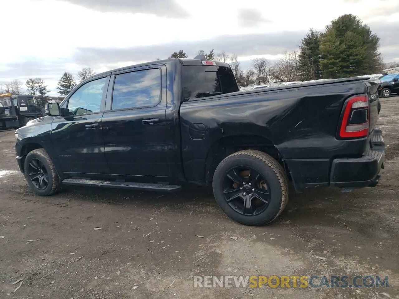 2 Photograph of a damaged car 1C6SRFFT2LN325654 RAM 1500 2020