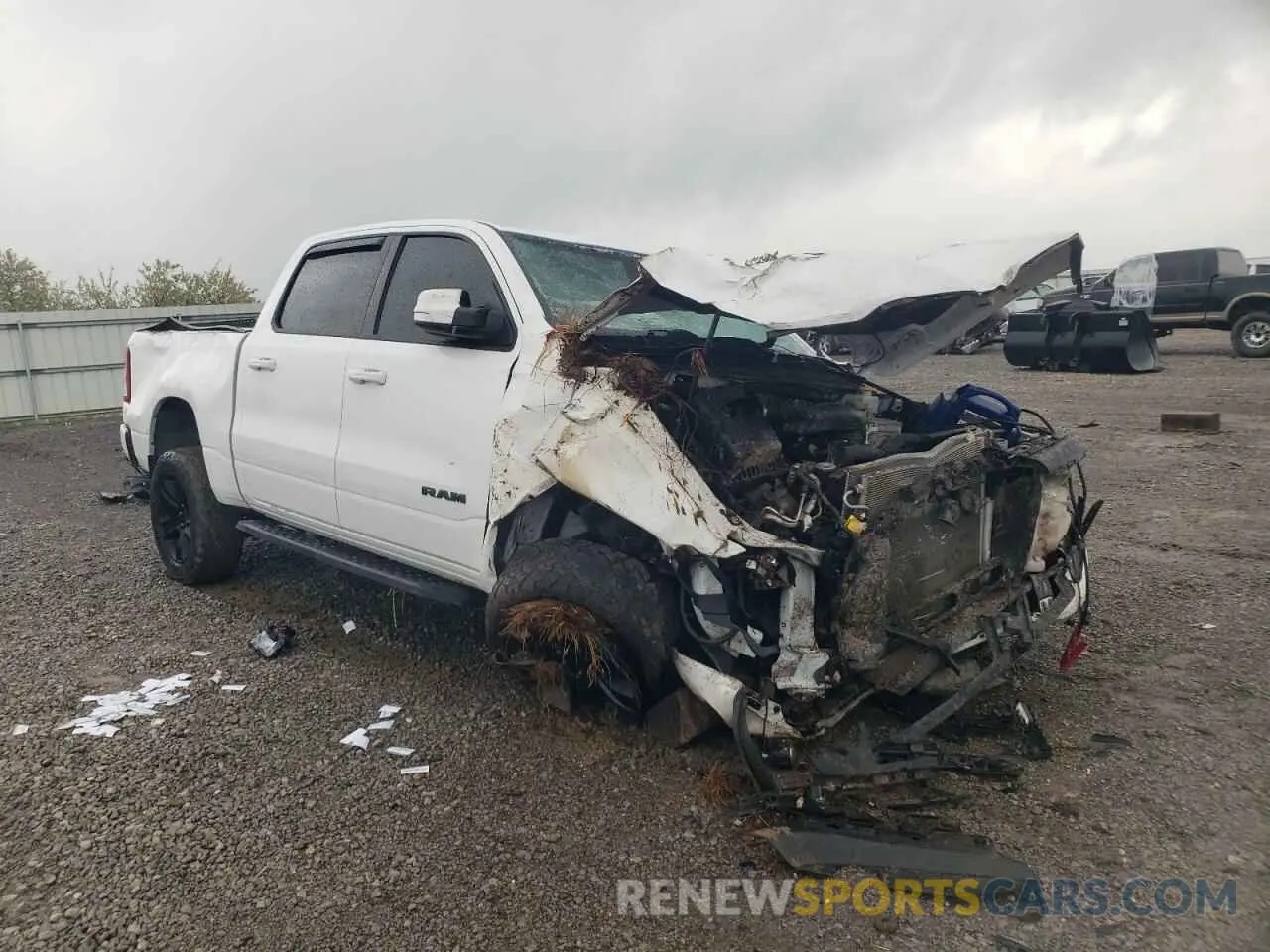 4 Photograph of a damaged car 1C6SRFFT2LN385269 RAM 1500 2020