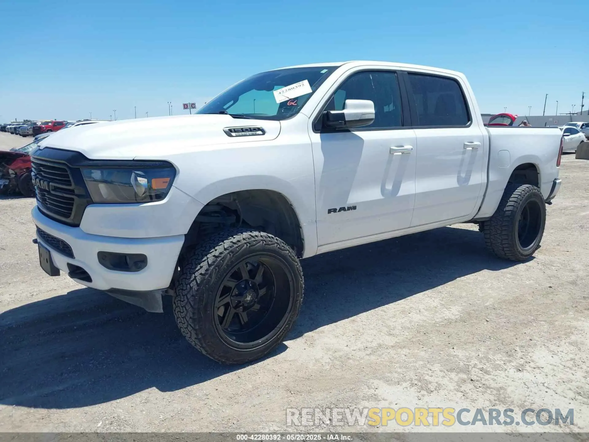 2 Photograph of a damaged car 1C6SRFFT2LN388110 RAM 1500 2020