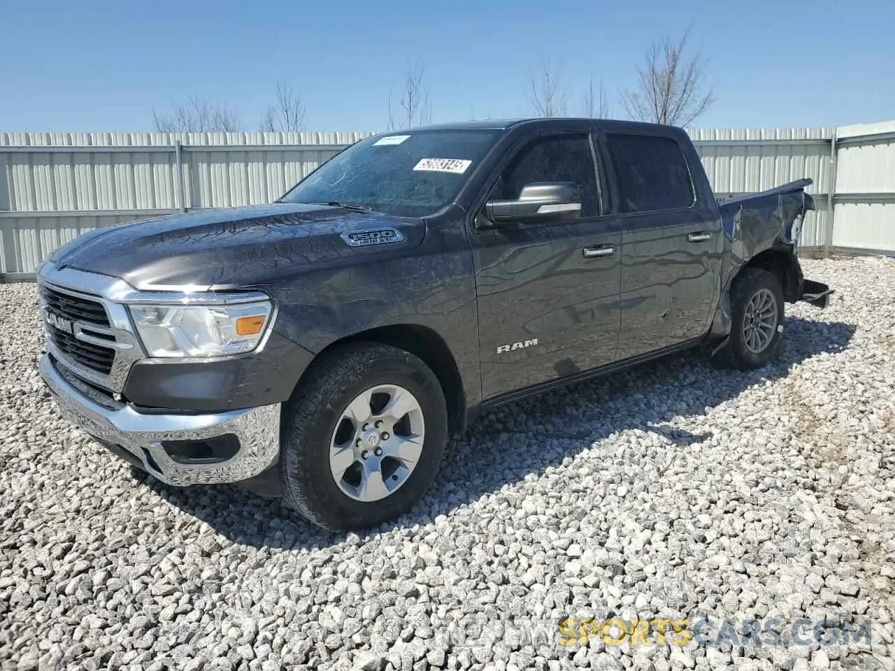 1 Photograph of a damaged car 1C6SRFFT2LN392027 RAM 1500 2020
