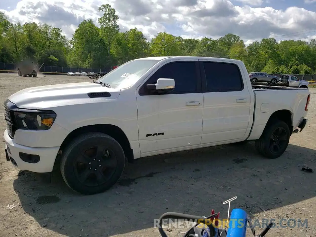 1 Photograph of a damaged car 1C6SRFFT3LN102037 RAM 1500 2020