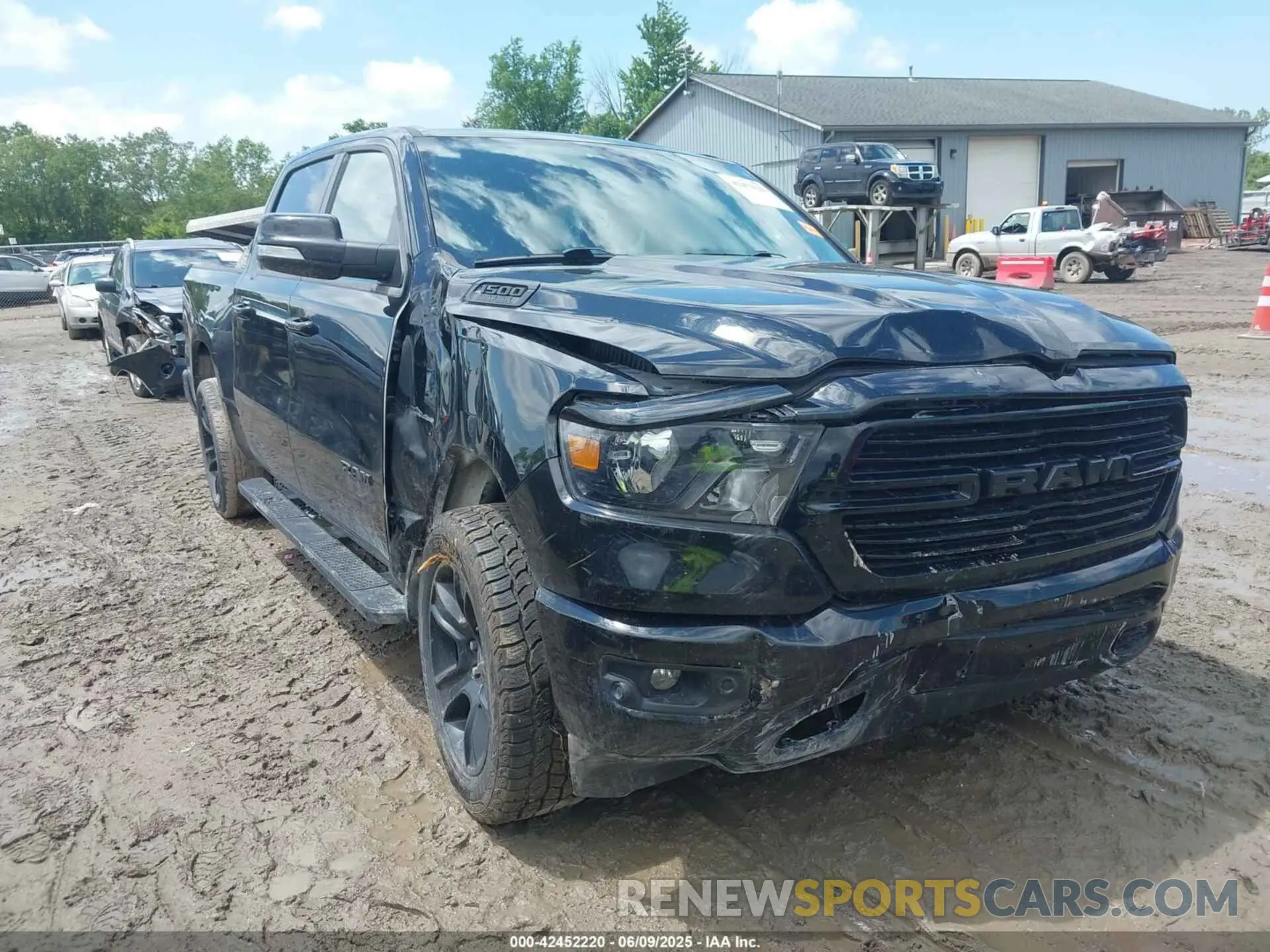 1 Photograph of a damaged car 1C6SRFFT3LN103124 RAM 1500 2020