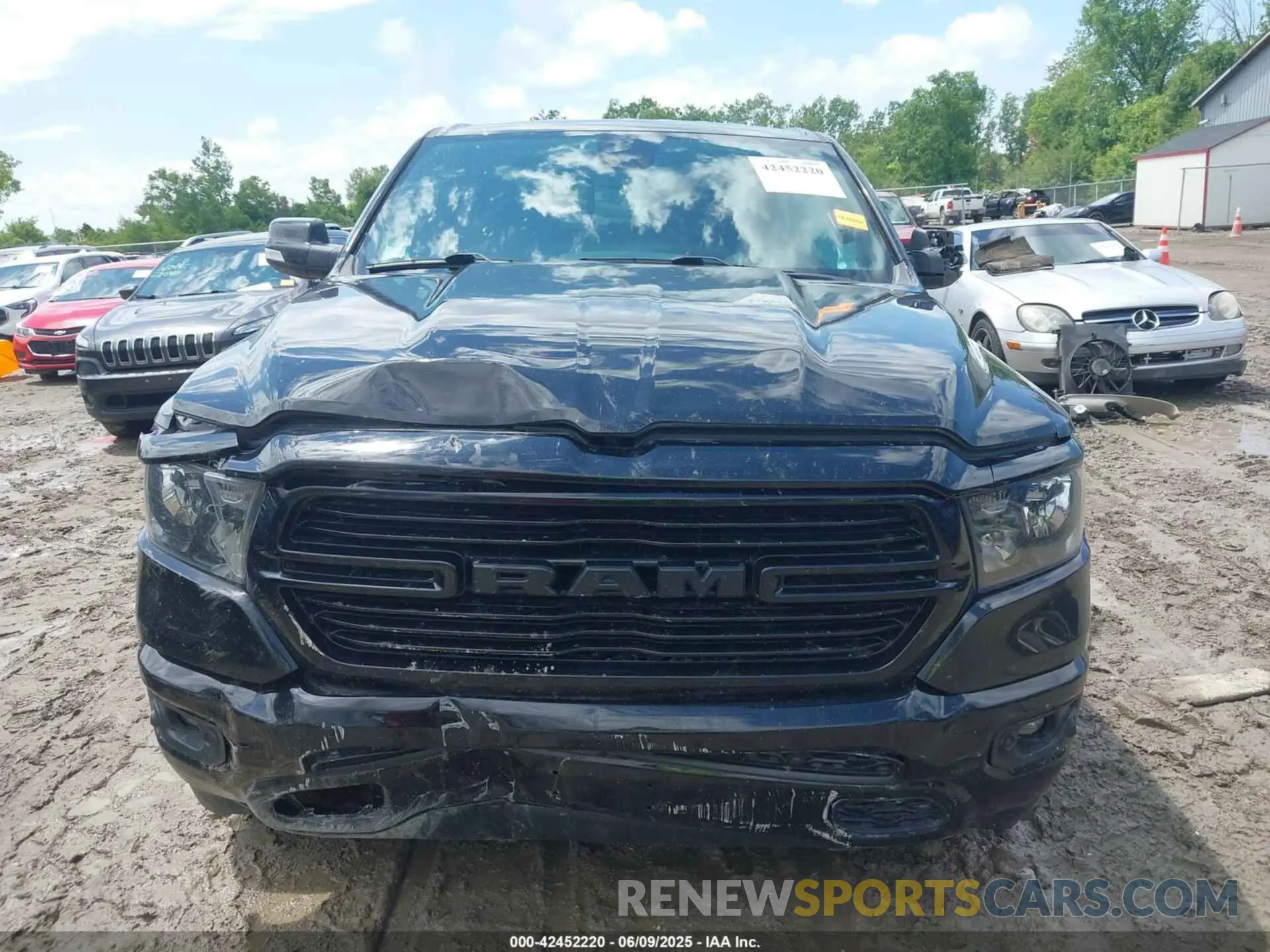 12 Photograph of a damaged car 1C6SRFFT3LN103124 RAM 1500 2020