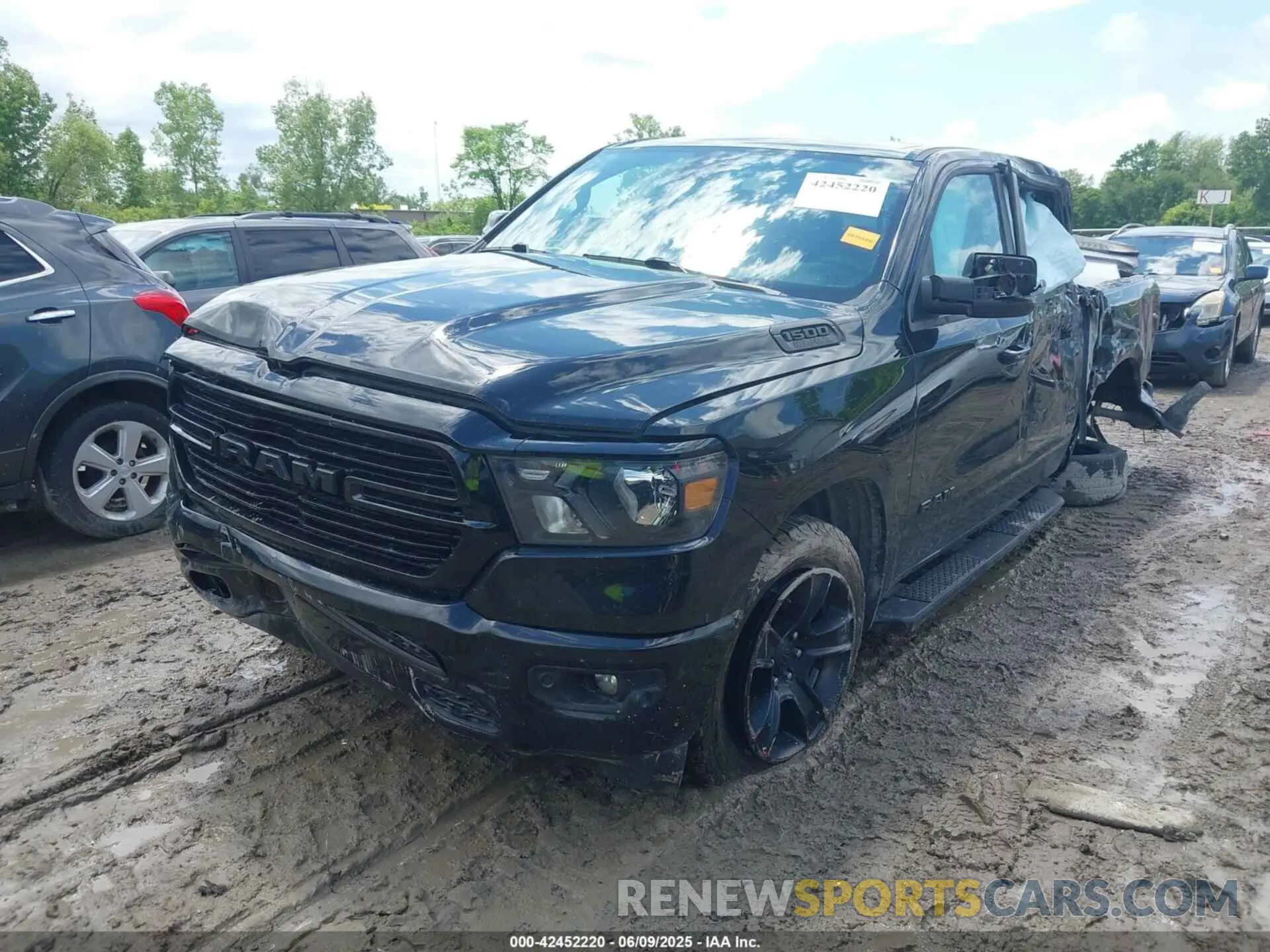 2 Photograph of a damaged car 1C6SRFFT3LN103124 RAM 1500 2020