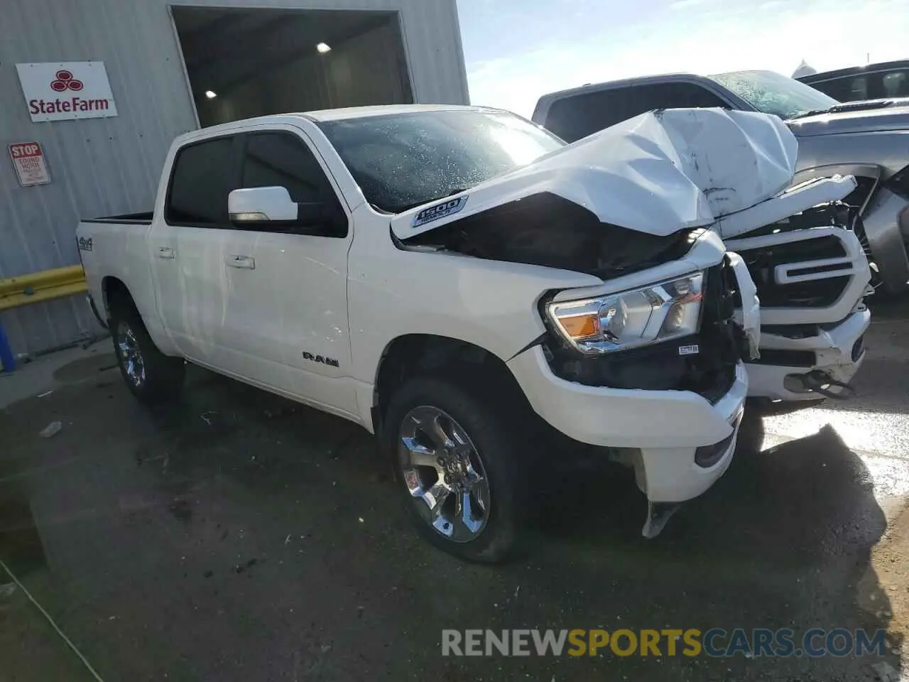 4 Photograph of a damaged car 1C6SRFFT3LN151643 RAM 1500 2020