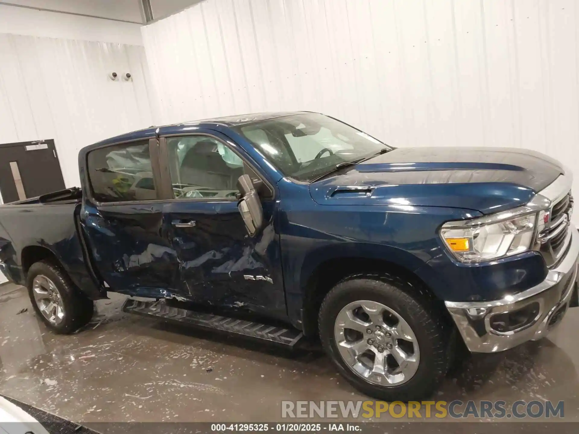 14 Photograph of a damaged car 1C6SRFFT3LN169642 RAM 1500 2020