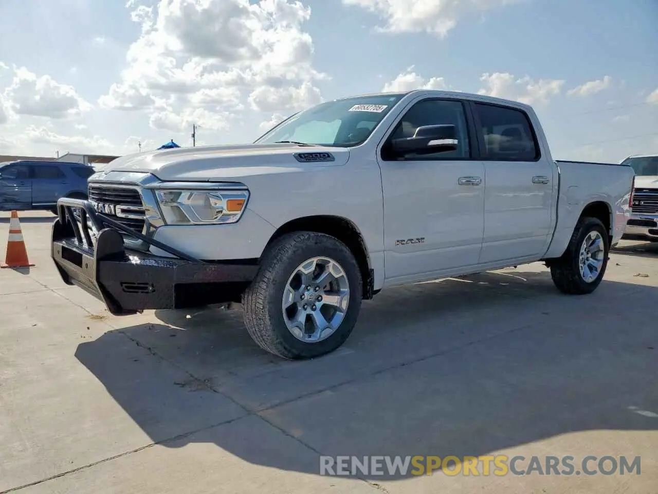 1 Photograph of a damaged car 1C6SRFFT3LN252018 RAM 1500 2020