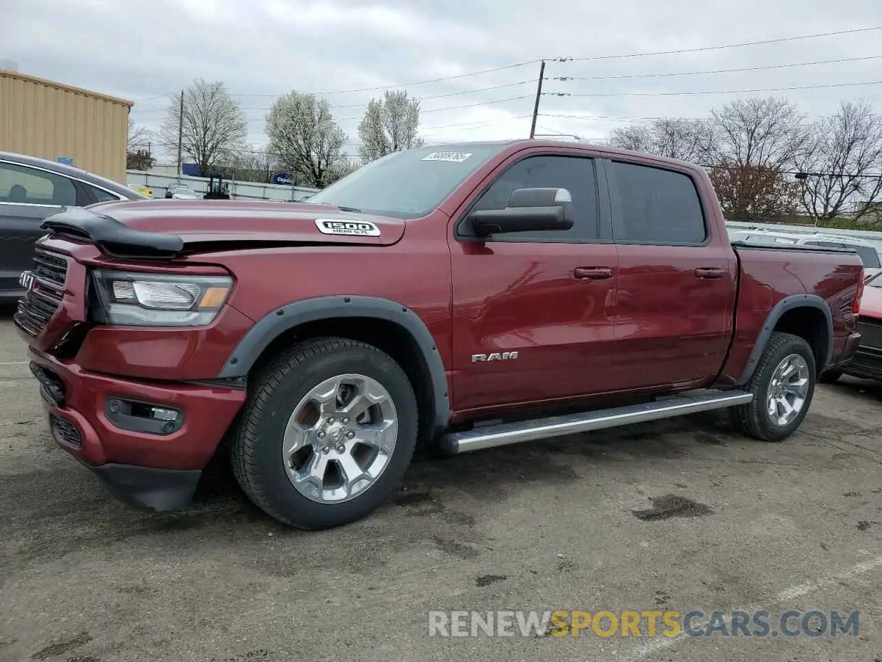 1 Photograph of a damaged car 1C6SRFFT3LN264203 RAM 1500 2020