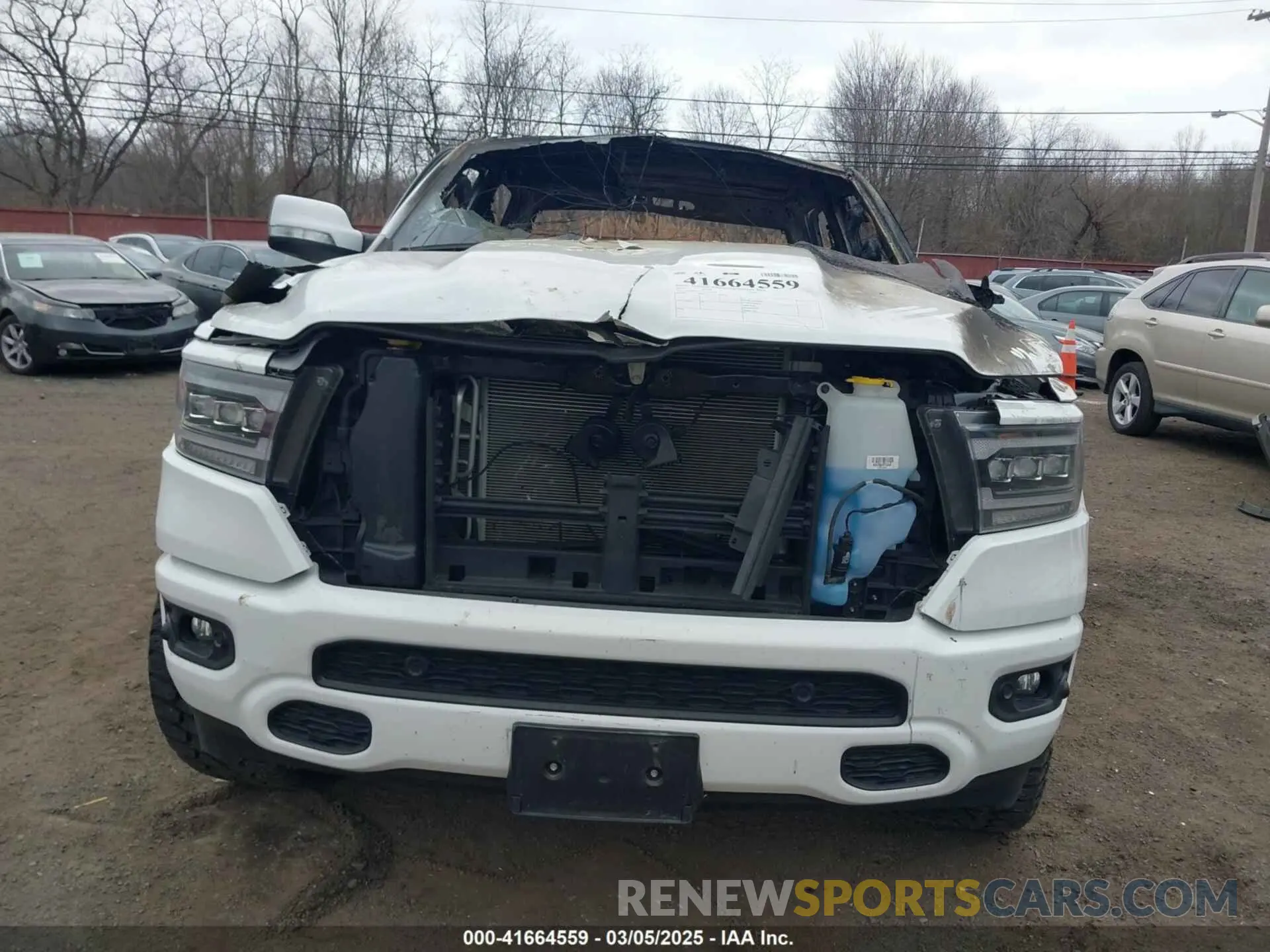 12 Photograph of a damaged car 1C6SRFFT3LN304070 RAM 1500 2020