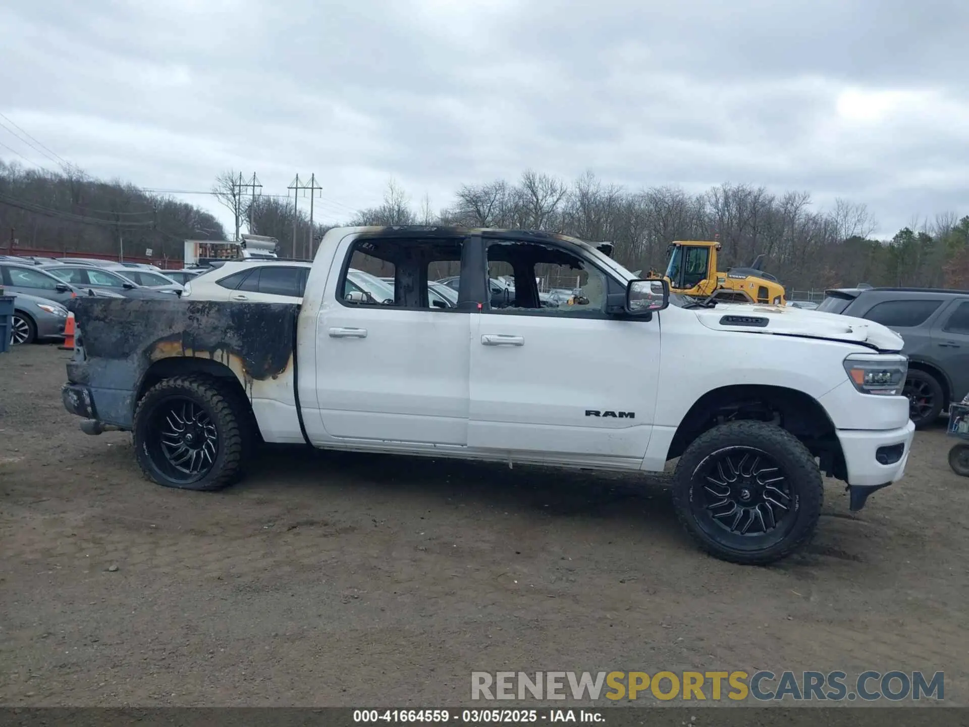 13 Photograph of a damaged car 1C6SRFFT3LN304070 RAM 1500 2020