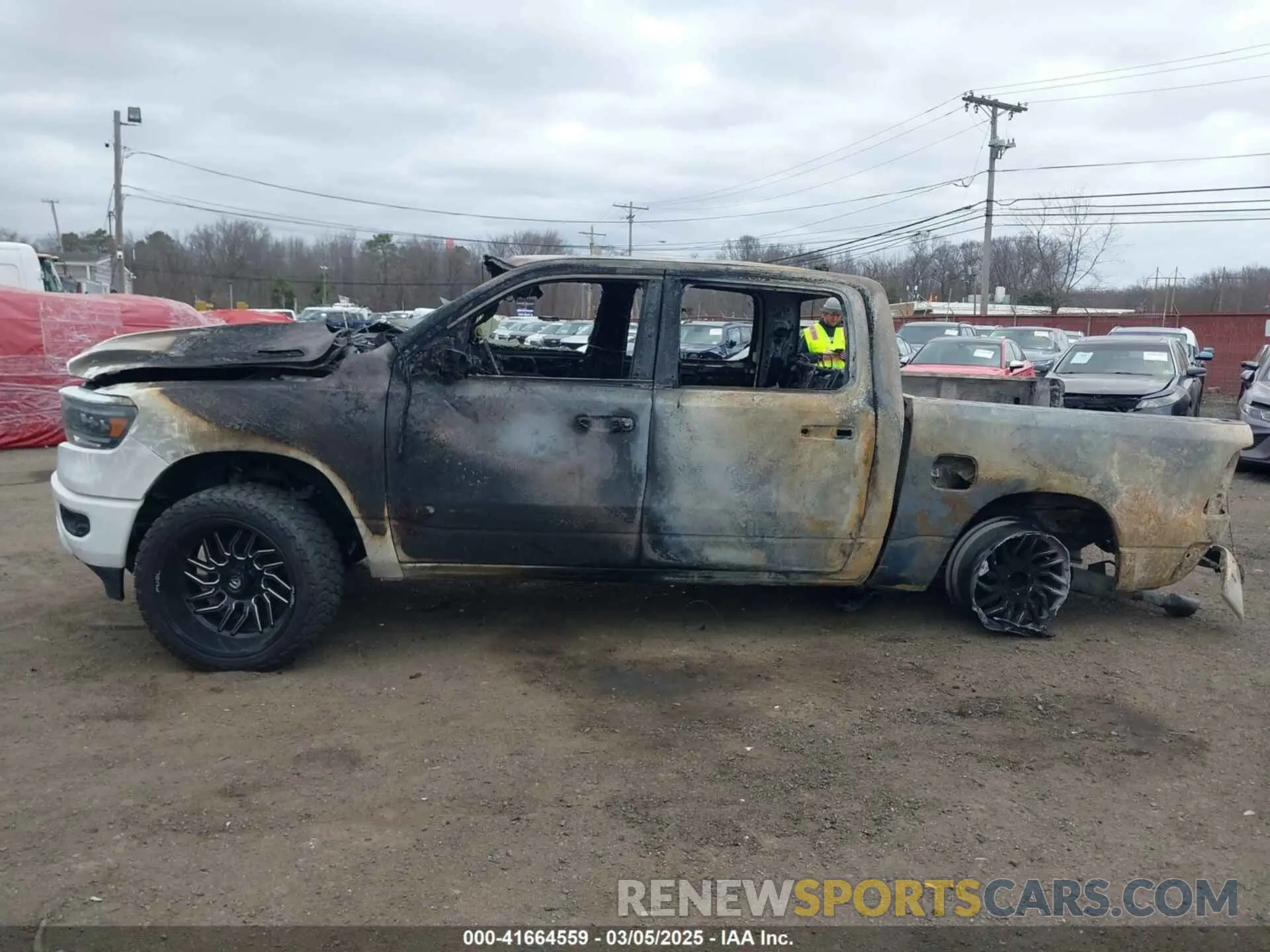 14 Photograph of a damaged car 1C6SRFFT3LN304070 RAM 1500 2020