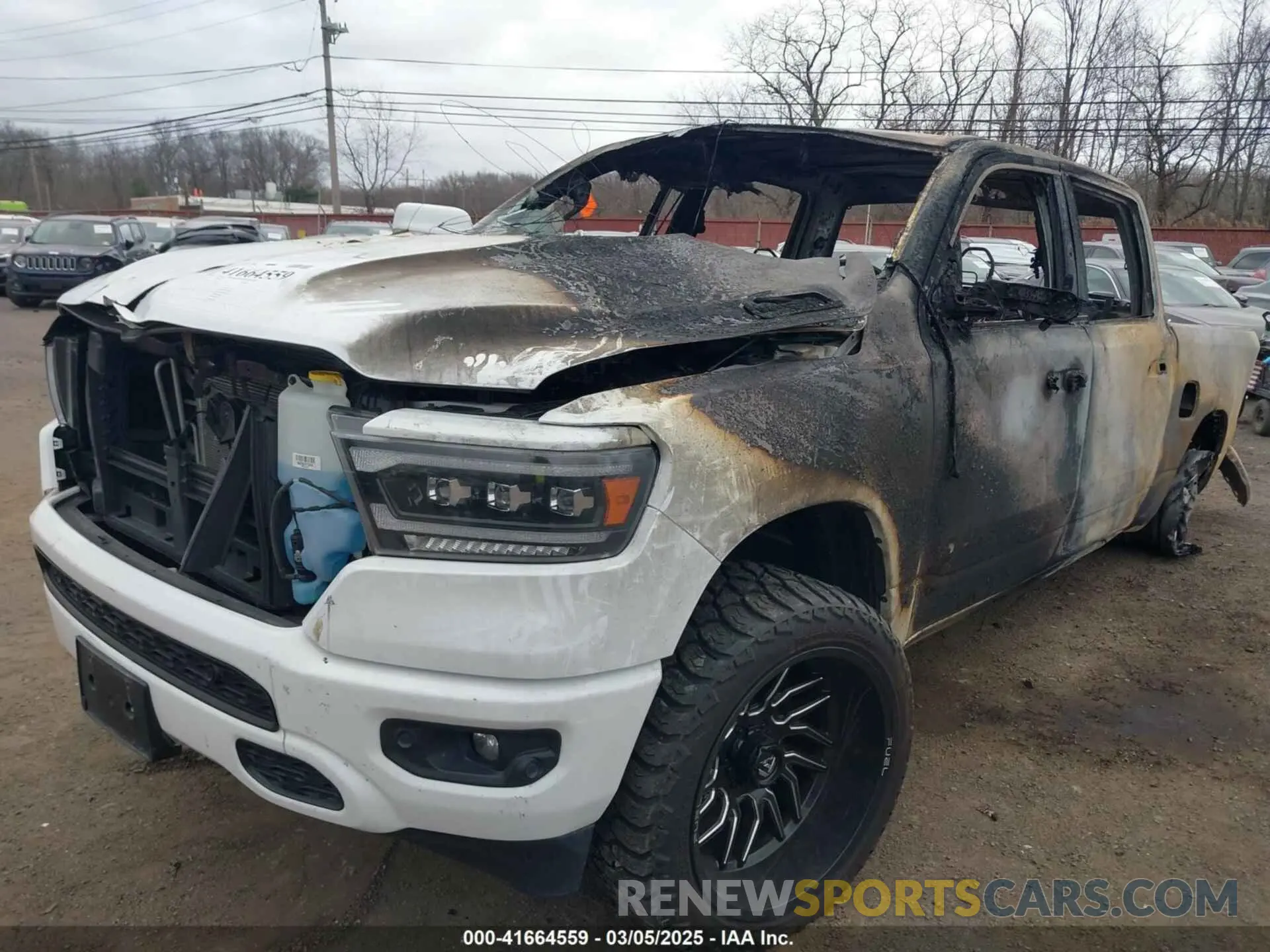 19 Photograph of a damaged car 1C6SRFFT3LN304070 RAM 1500 2020