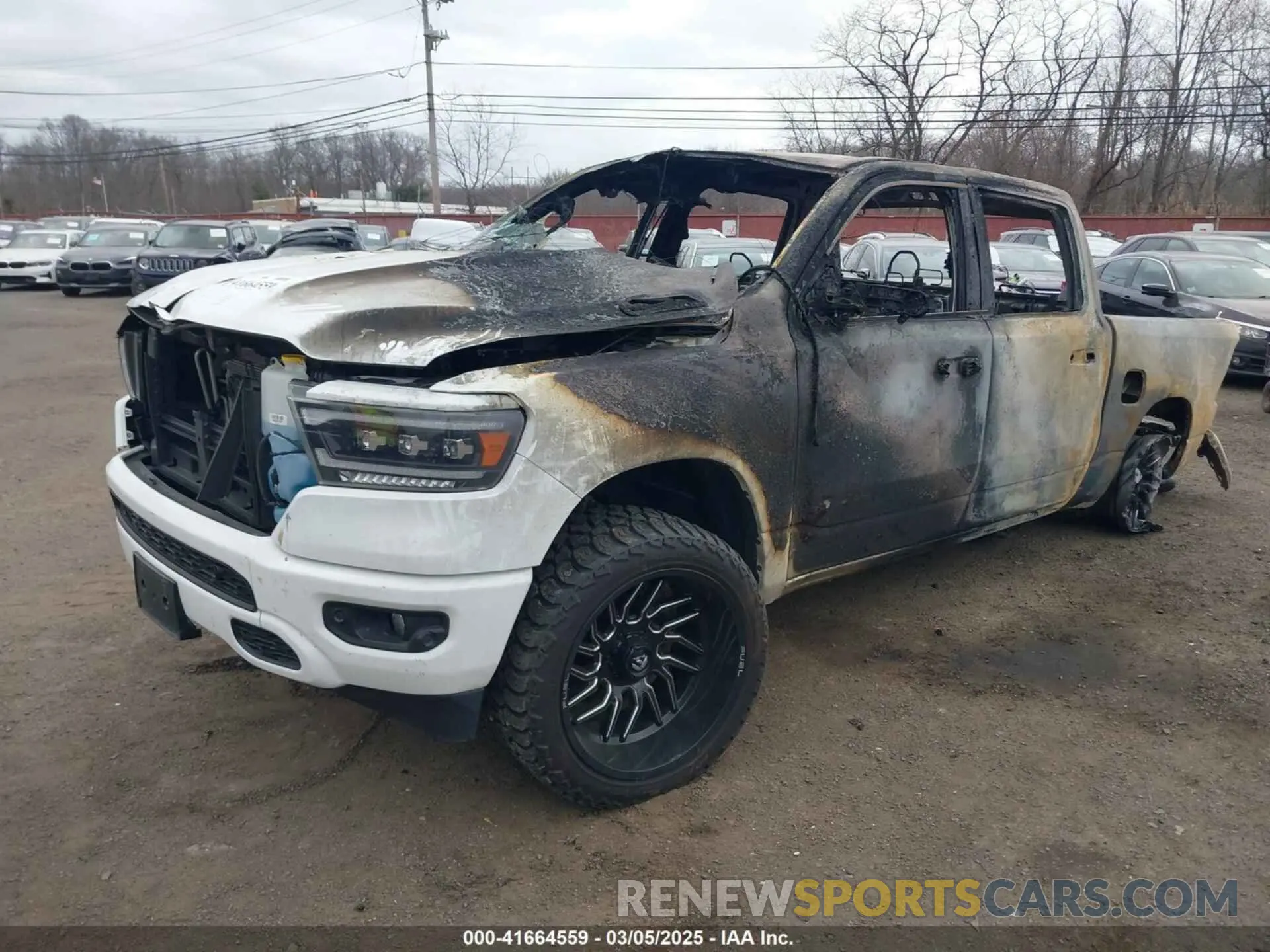 2 Photograph of a damaged car 1C6SRFFT3LN304070 RAM 1500 2020