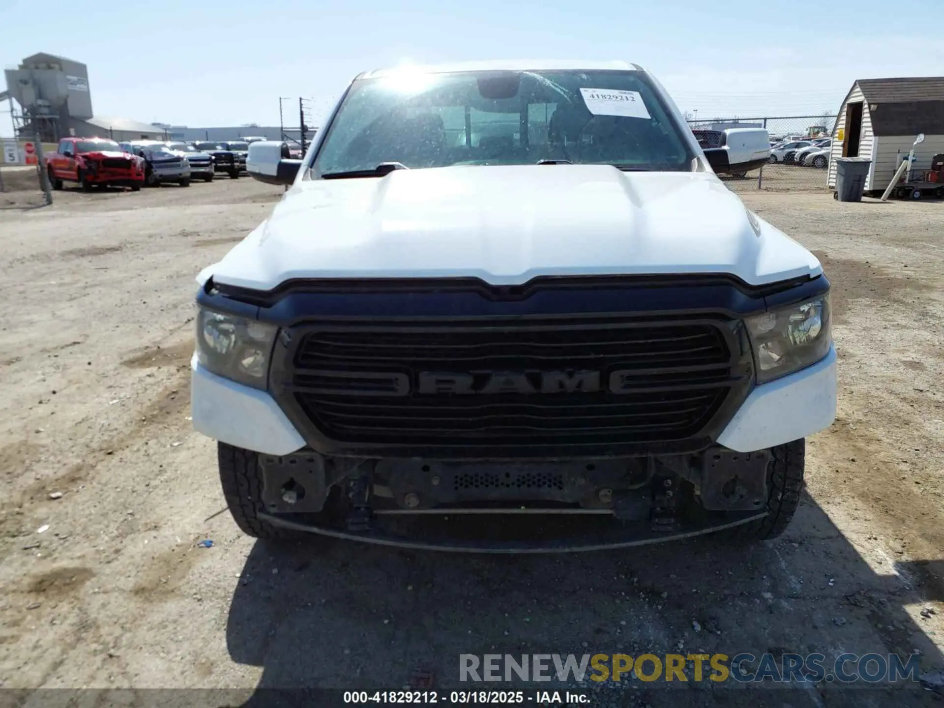13 Photograph of a damaged car 1C6SRFFT3LN347291 RAM 1500 2020