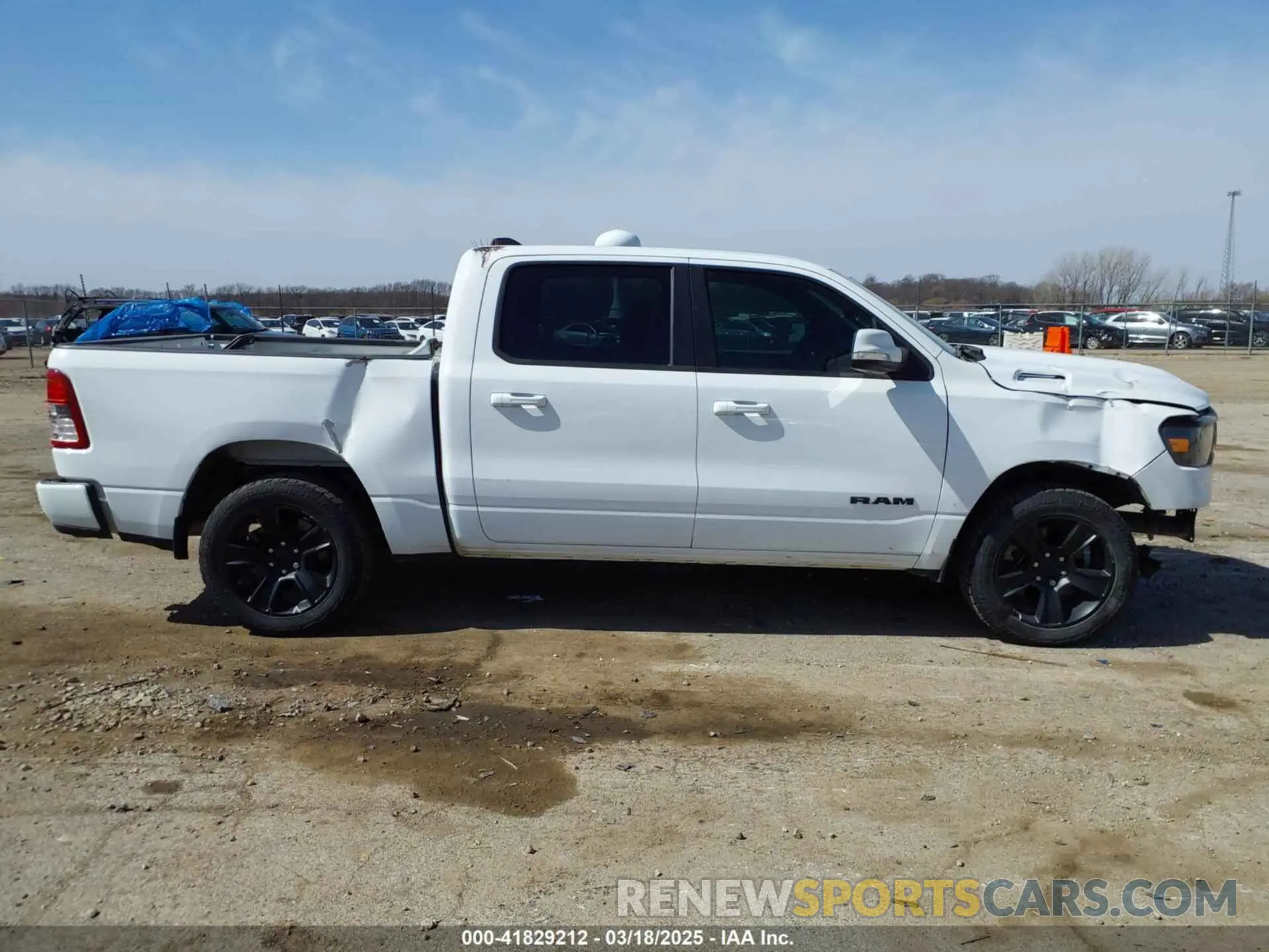 14 Photograph of a damaged car 1C6SRFFT3LN347291 RAM 1500 2020