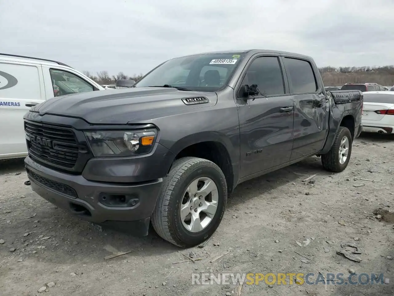 1 Photograph of a damaged car 1C6SRFFT3LN365404 RAM 1500 2020