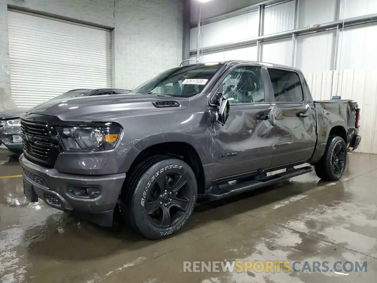 1 Photograph of a damaged car 1C6SRFFT3LN375902 RAM 1500 2020
