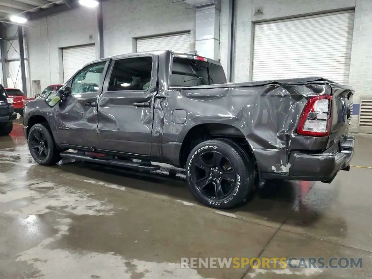 2 Photograph of a damaged car 1C6SRFFT3LN375902 RAM 1500 2020