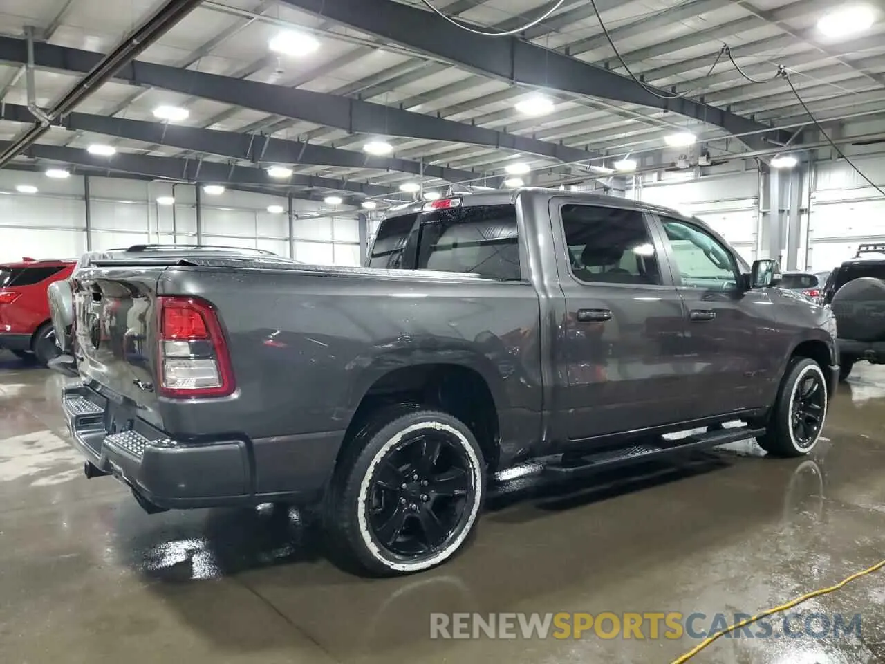 3 Photograph of a damaged car 1C6SRFFT3LN375902 RAM 1500 2020