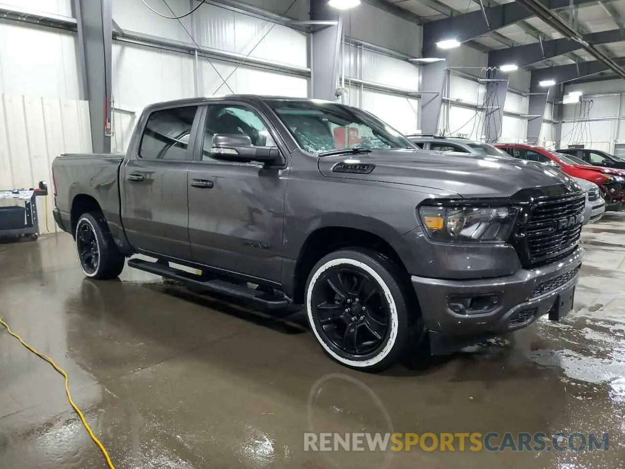 4 Photograph of a damaged car 1C6SRFFT3LN375902 RAM 1500 2020