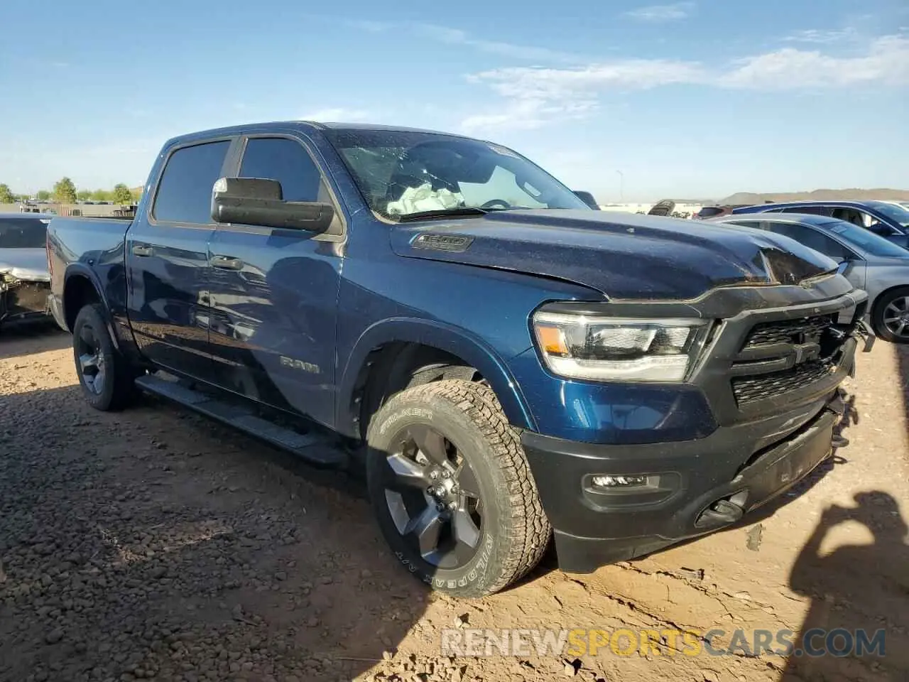 4 Photograph of a damaged car 1C6SRFFT3LN410700 RAM 1500 2020