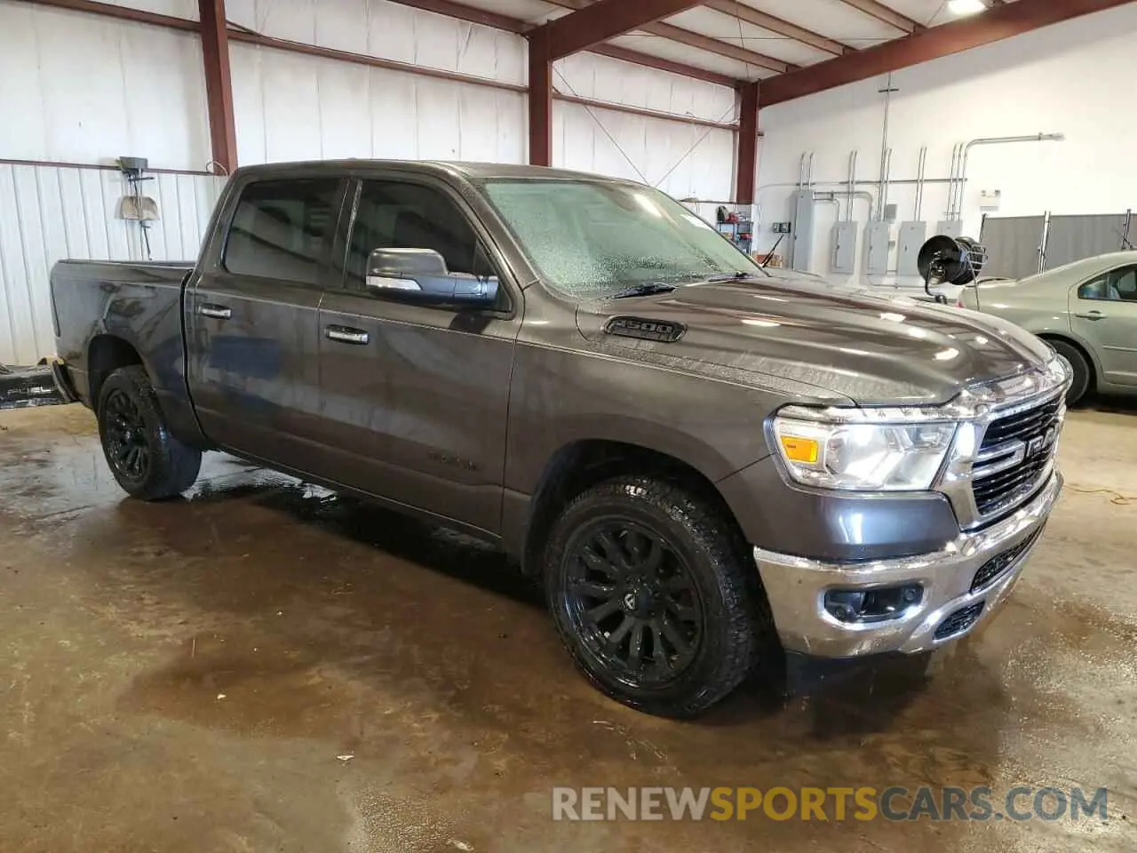 4 Photograph of a damaged car 1C6SRFFT4LN140098 RAM 1500 2020