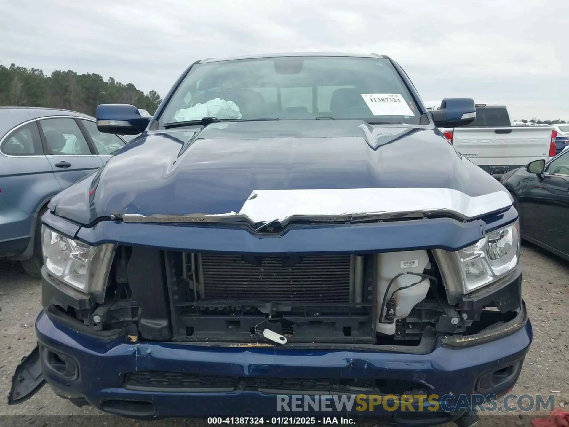 13 Photograph of a damaged car 1C6SRFFT4LN284329 RAM 1500 2020