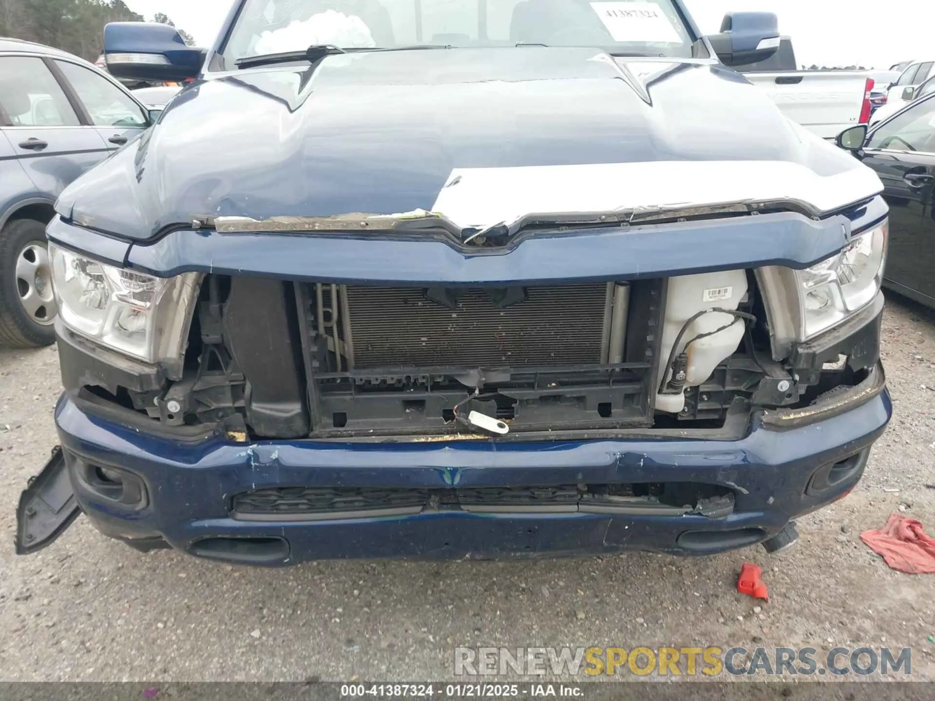 6 Photograph of a damaged car 1C6SRFFT4LN284329 RAM 1500 2020