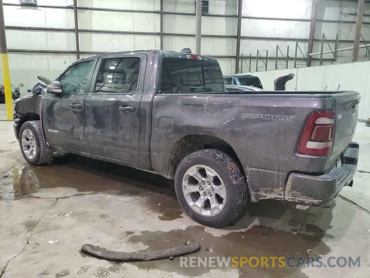 2 Photograph of a damaged car 1C6SRFFT4LN314235 RAM 1500 2020