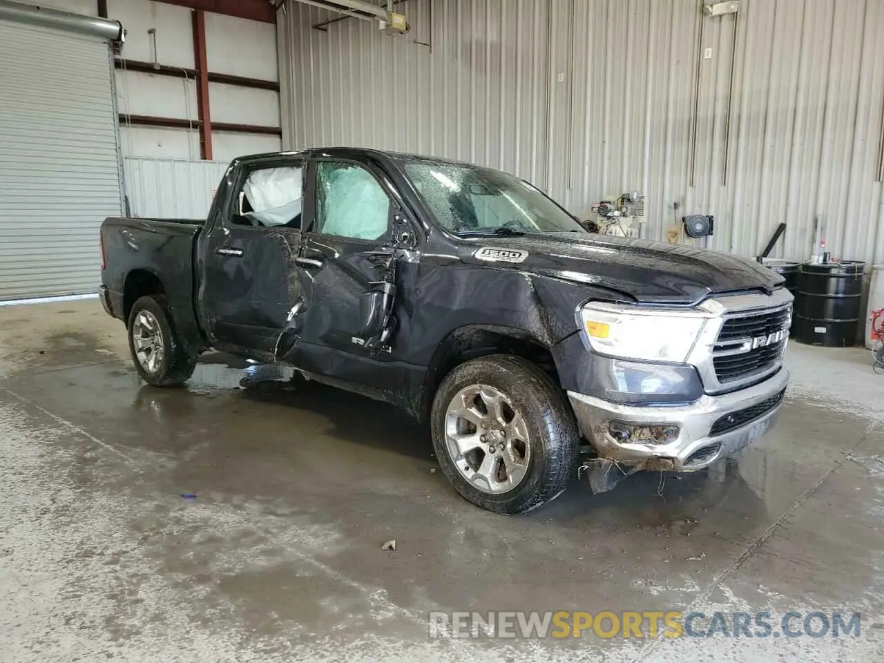 4 Photograph of a damaged car 1C6SRFFT4LN398640 RAM 1500 2020
