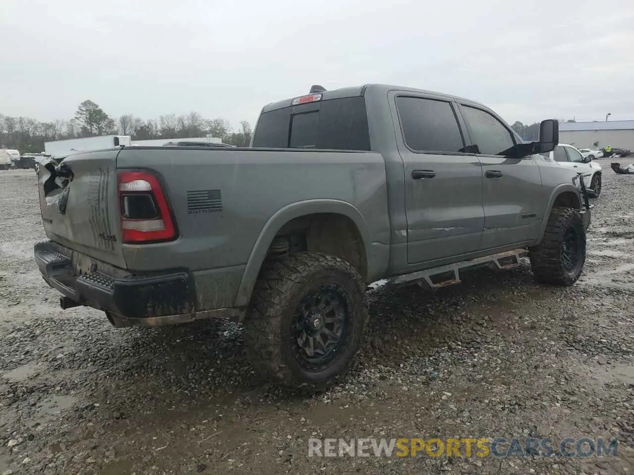 3 Photograph of a damaged car 1C6SRFFT4LN409832 RAM 1500 2020