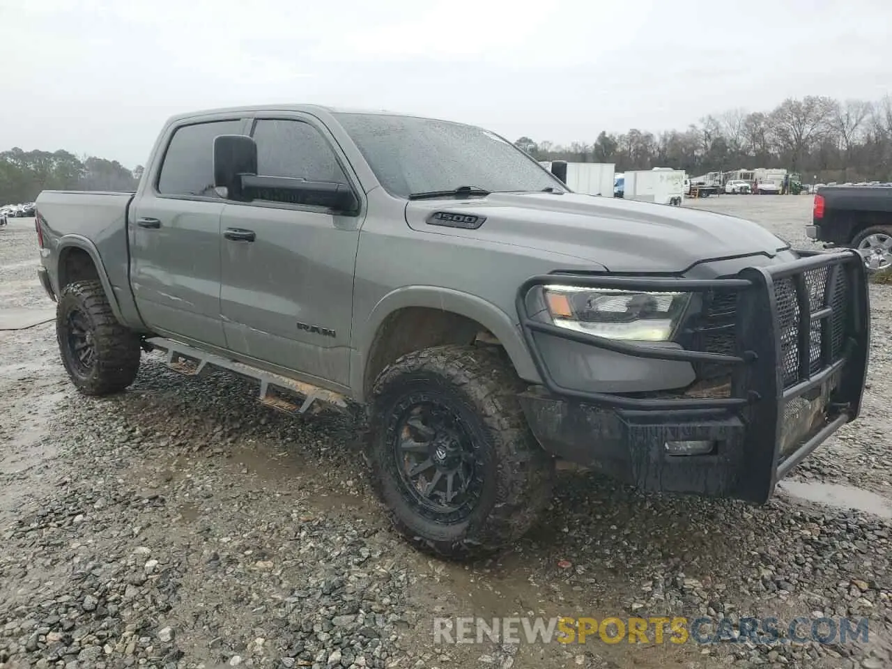4 Photograph of a damaged car 1C6SRFFT4LN409832 RAM 1500 2020