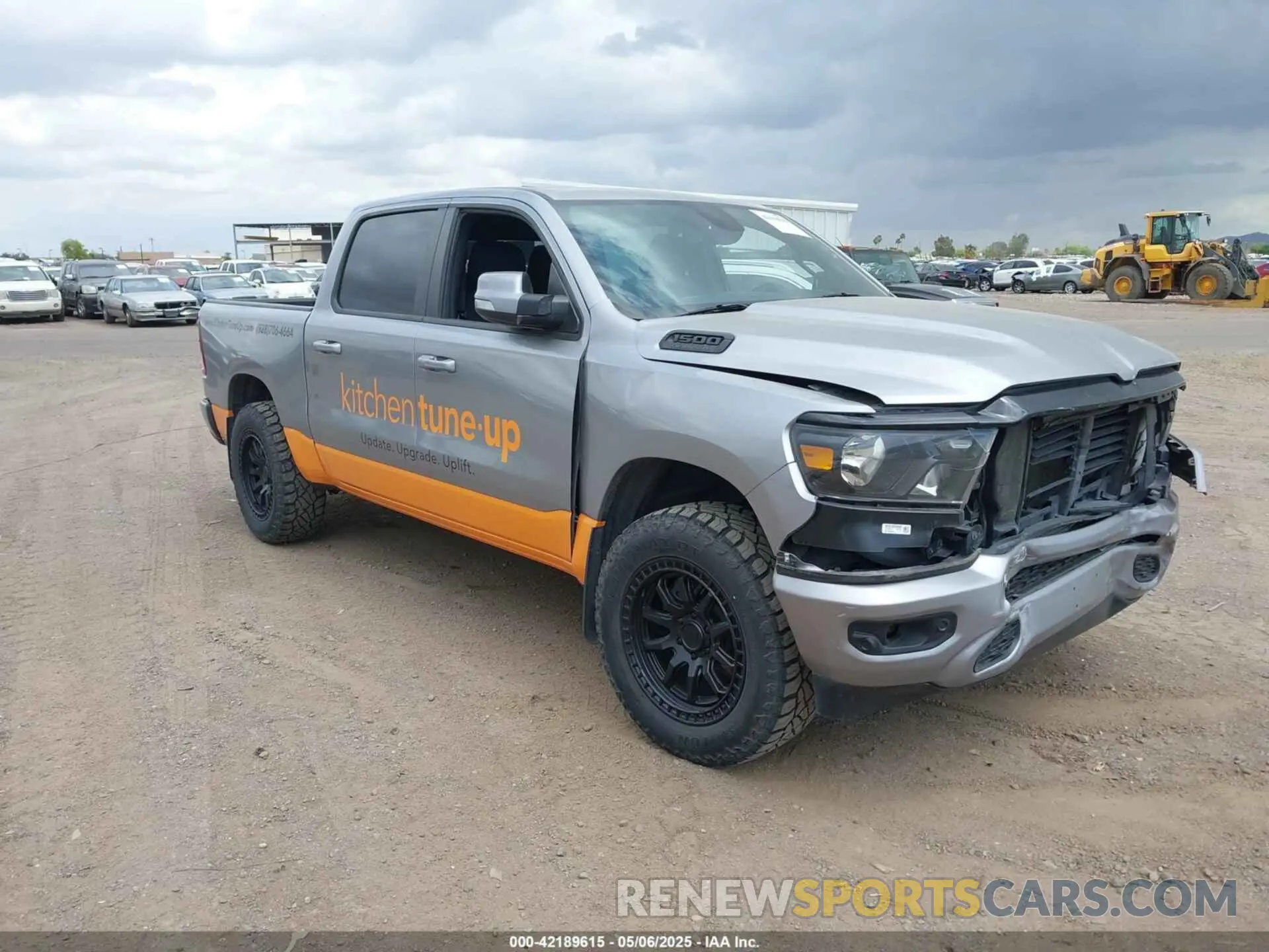 1 Photograph of a damaged car 1C6SRFFT5LN162191 RAM 1500 2020