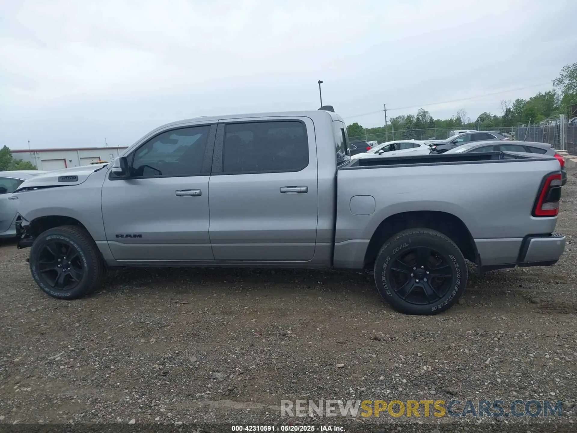 14 Photograph of a damaged car 1C6SRFFT5LN184997 RAM 1500 2020