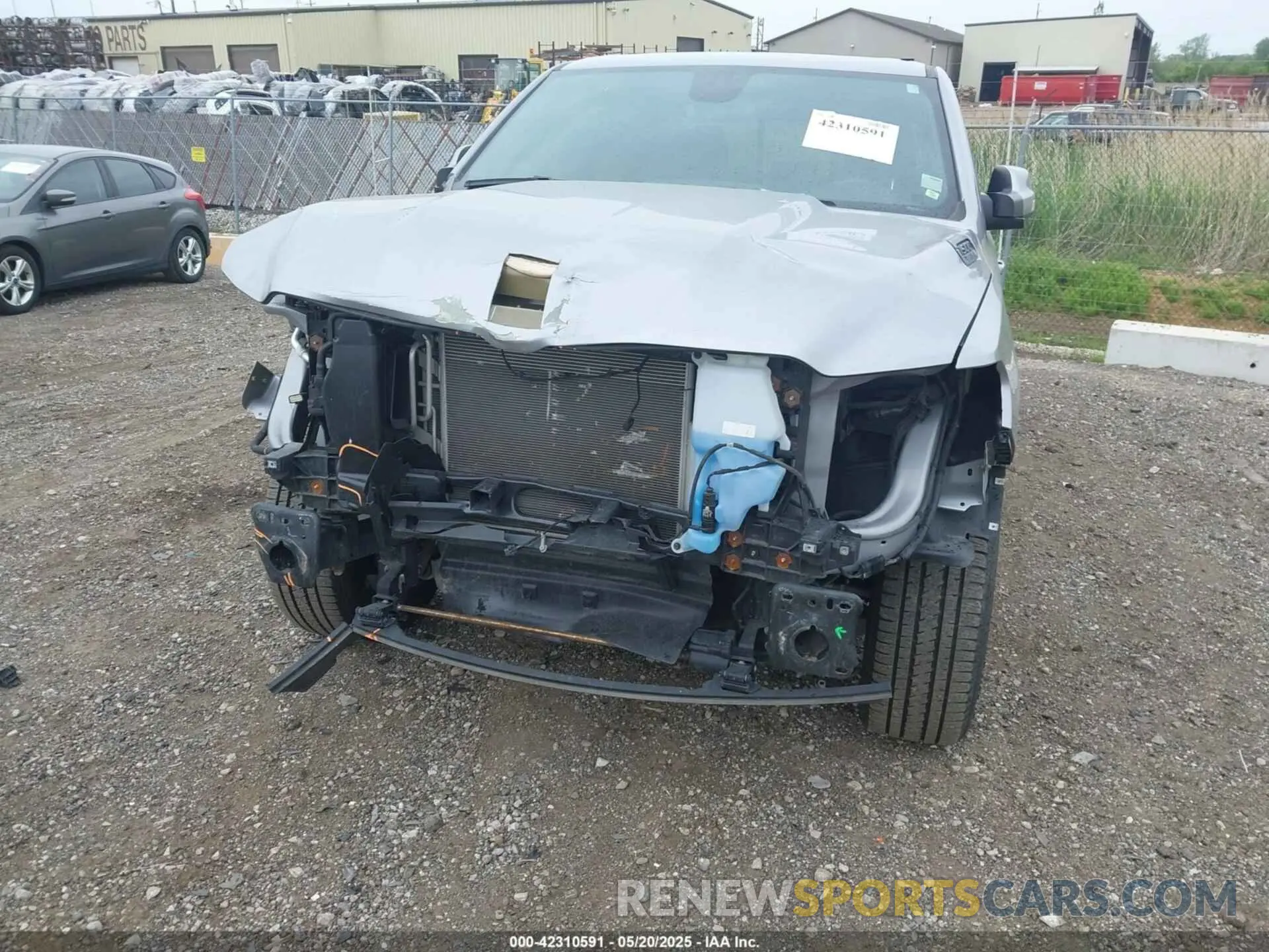 6 Photograph of a damaged car 1C6SRFFT5LN184997 RAM 1500 2020