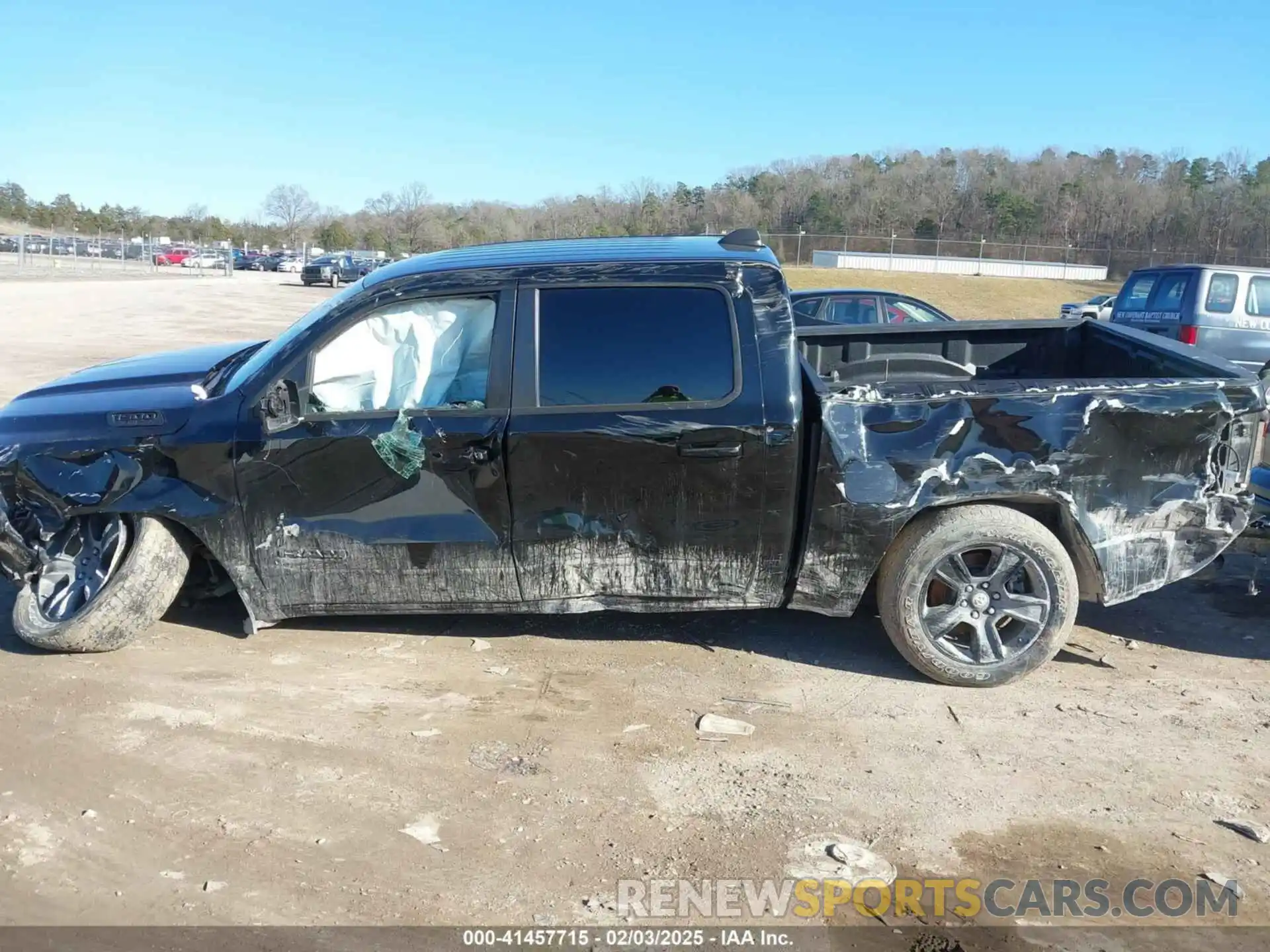 14 Photograph of a damaged car 1C6SRFFT5LN330864 RAM 1500 2020