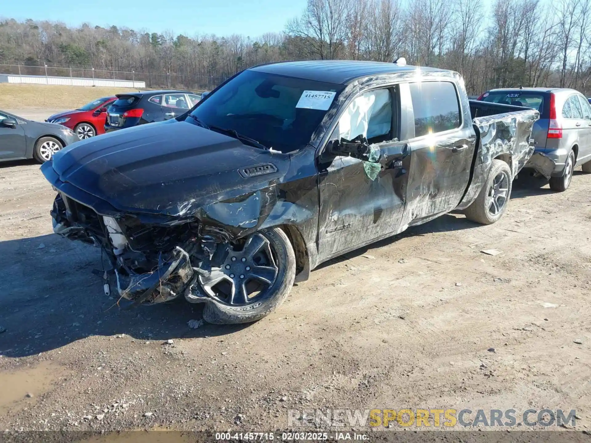 2 Photograph of a damaged car 1C6SRFFT5LN330864 RAM 1500 2020