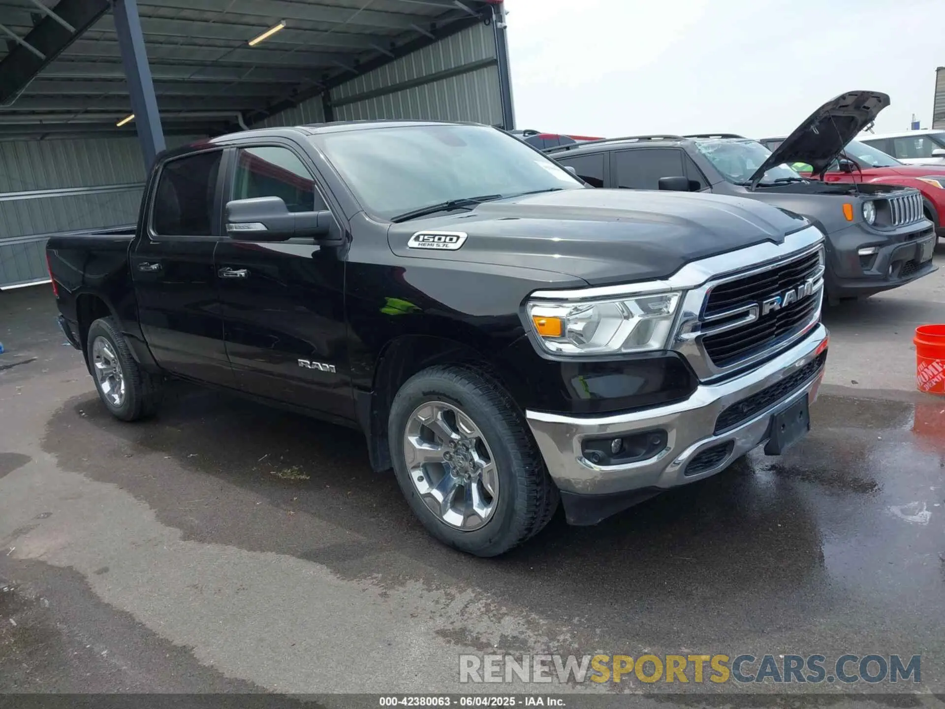 1 Photograph of a damaged car 1C6SRFFT5LN394113 RAM 1500 2020