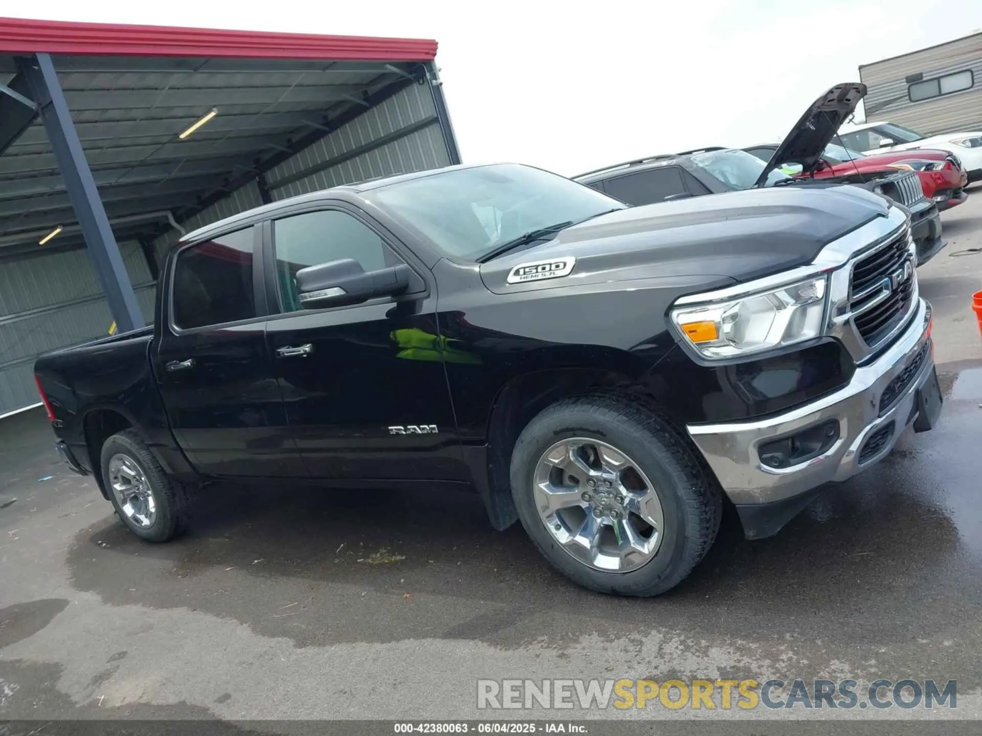 14 Photograph of a damaged car 1C6SRFFT5LN394113 RAM 1500 2020