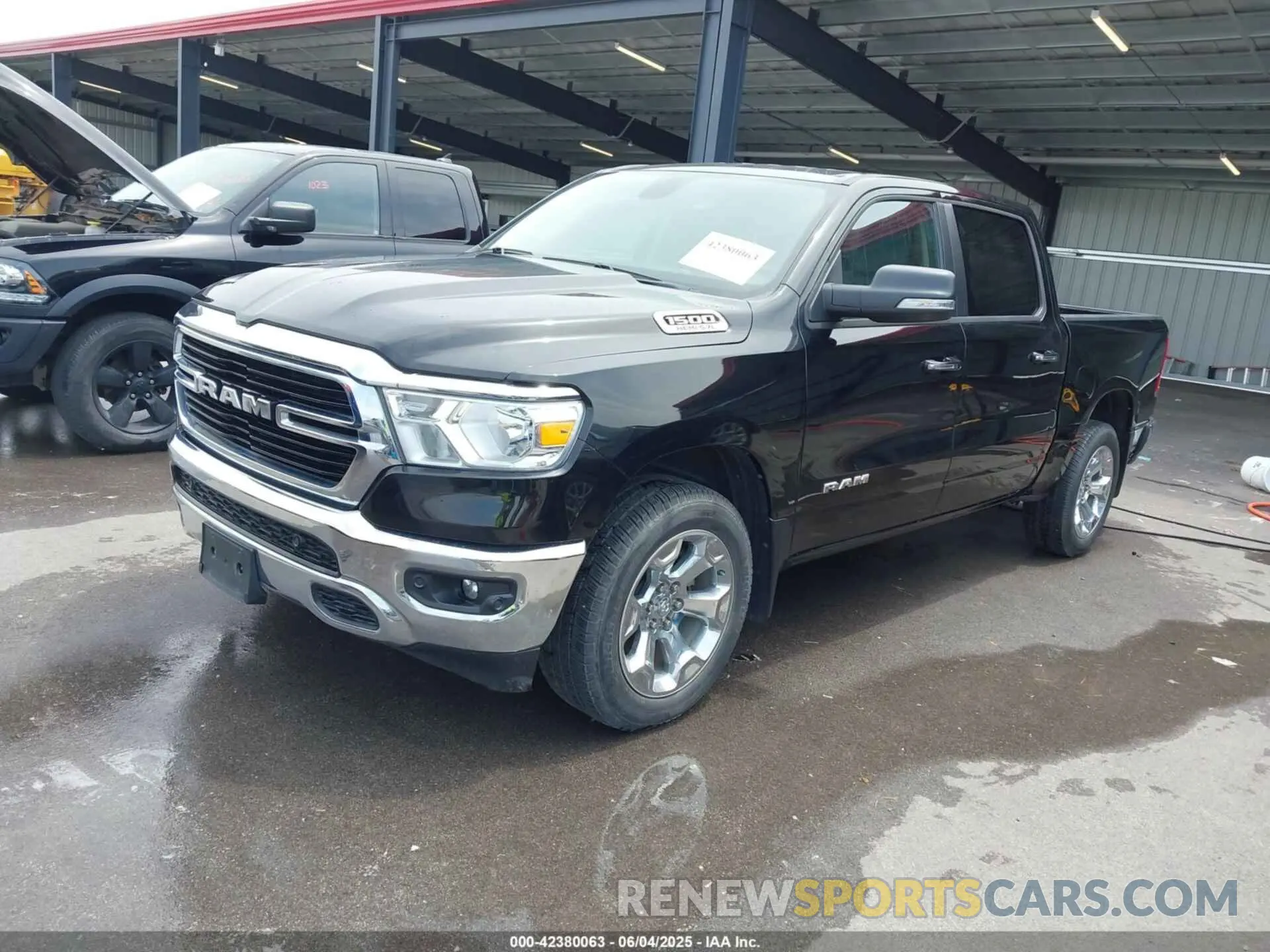 2 Photograph of a damaged car 1C6SRFFT5LN394113 RAM 1500 2020