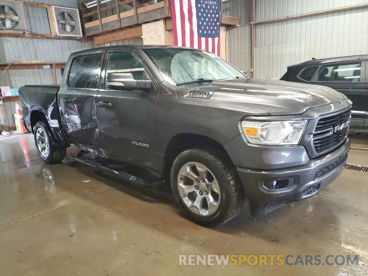 4 Photograph of a damaged car 1C6SRFFT6LN111315 RAM 1500 2020