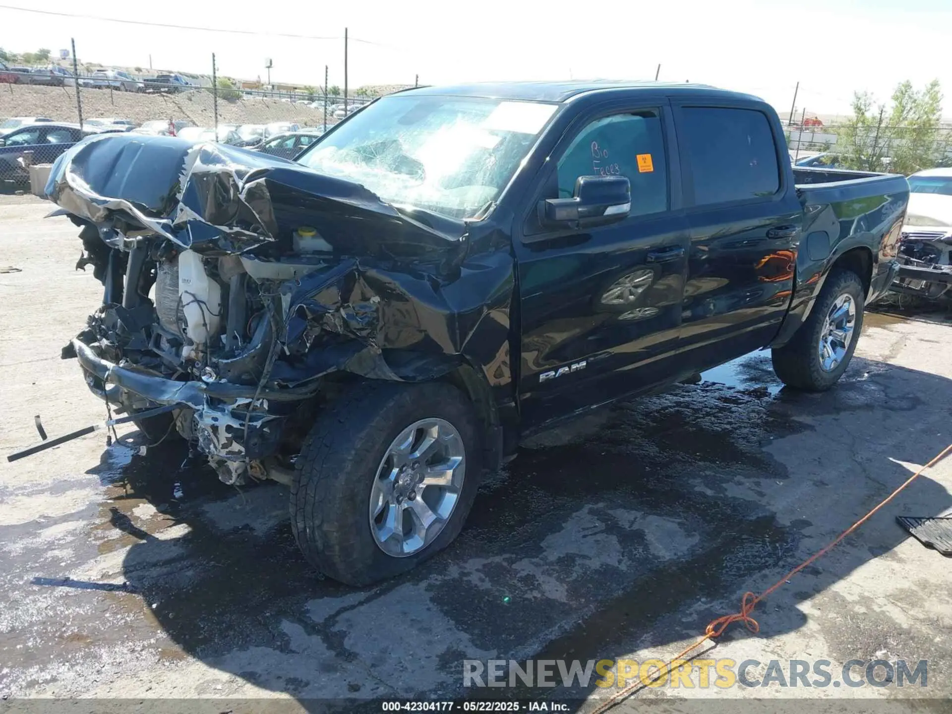 2 Photograph of a damaged car 1C6SRFFT6LN173474 RAM 1500 2020