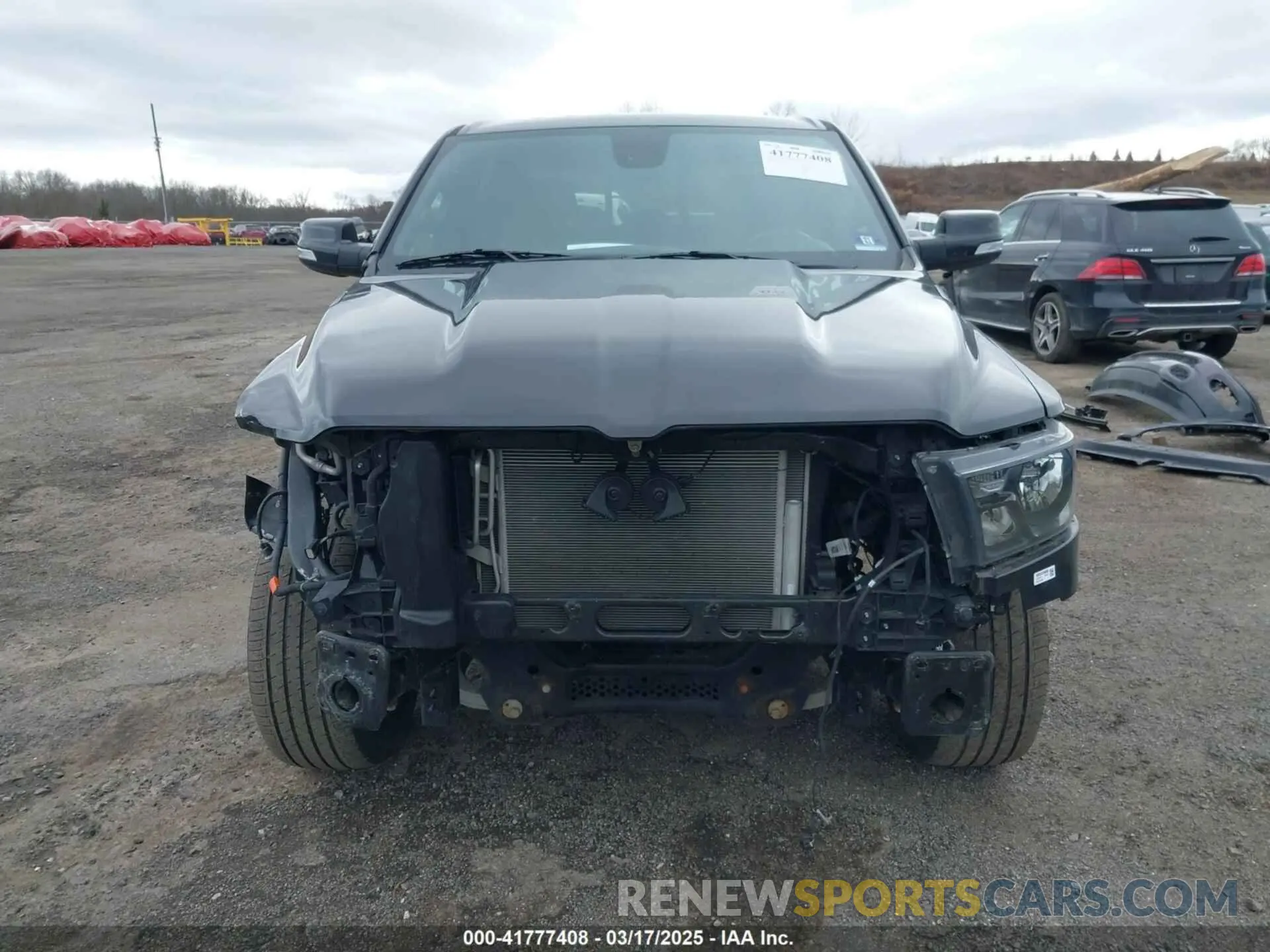 13 Photograph of a damaged car 1C6SRFFT6LN183373 RAM 1500 2020