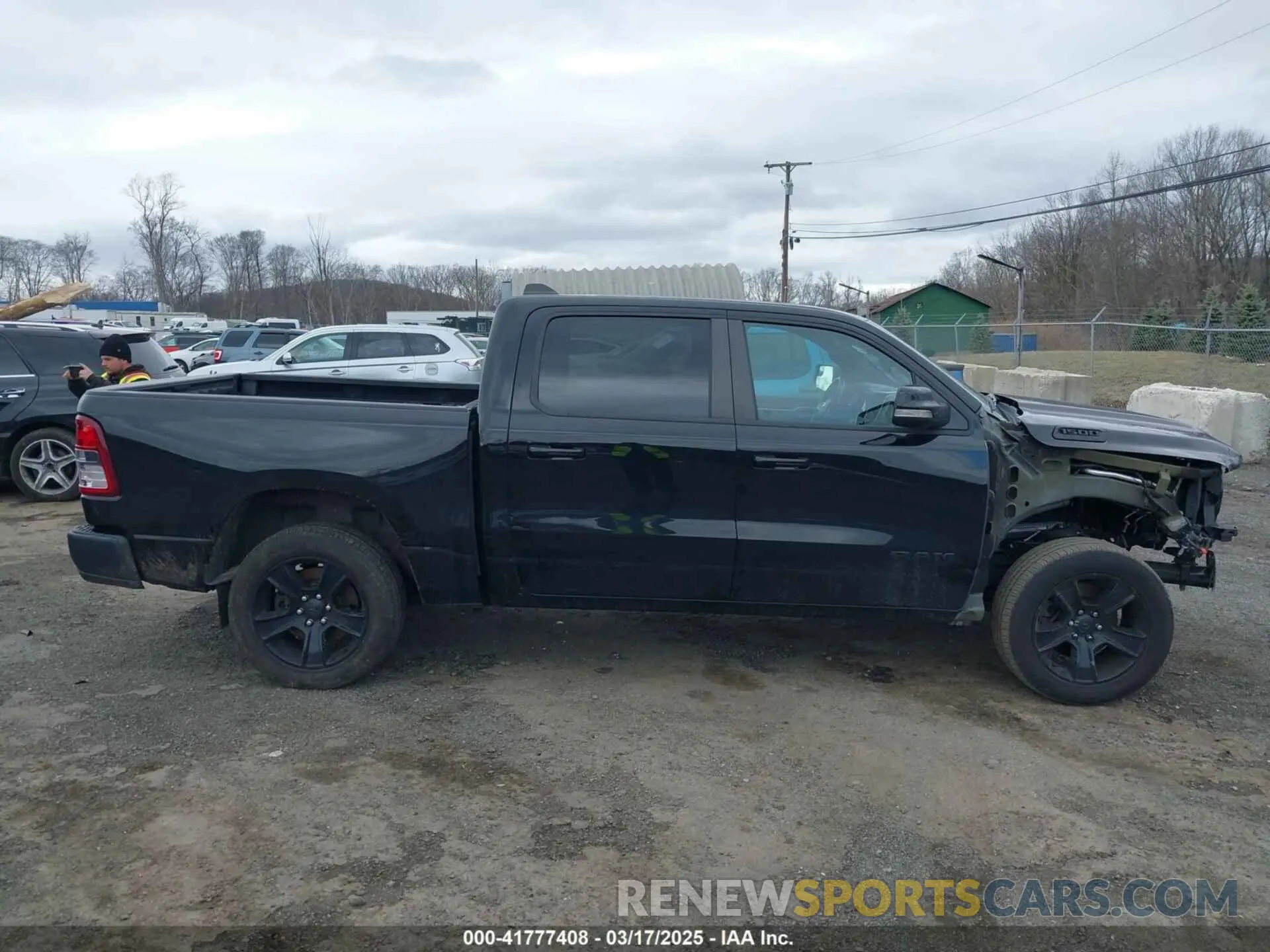 14 Photograph of a damaged car 1C6SRFFT6LN183373 RAM 1500 2020
