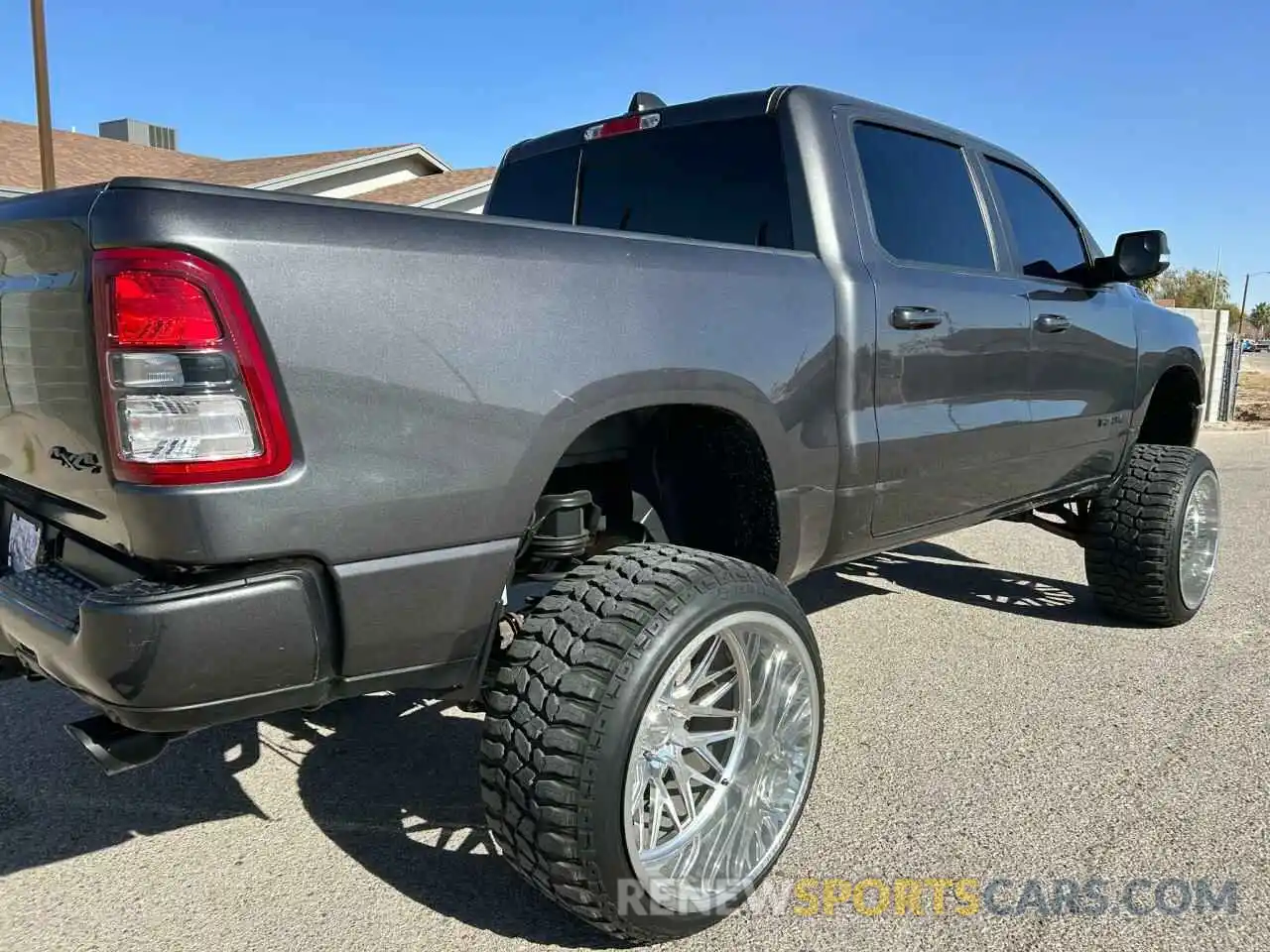 4 Photograph of a damaged car 1C6SRFFT6LN303897 RAM 1500 2020