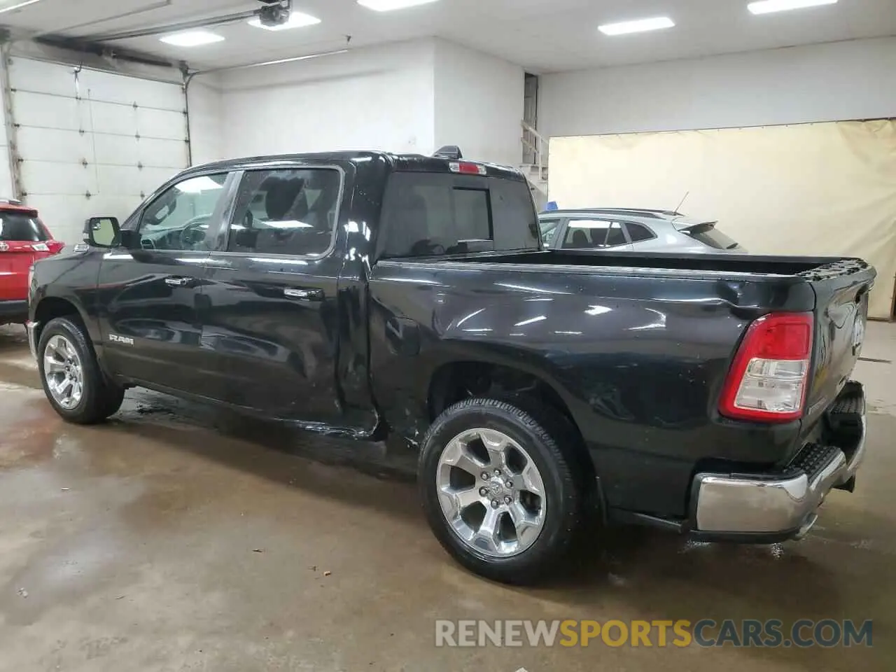 2 Photograph of a damaged car 1C6SRFFT6LN327102 RAM 1500 2020